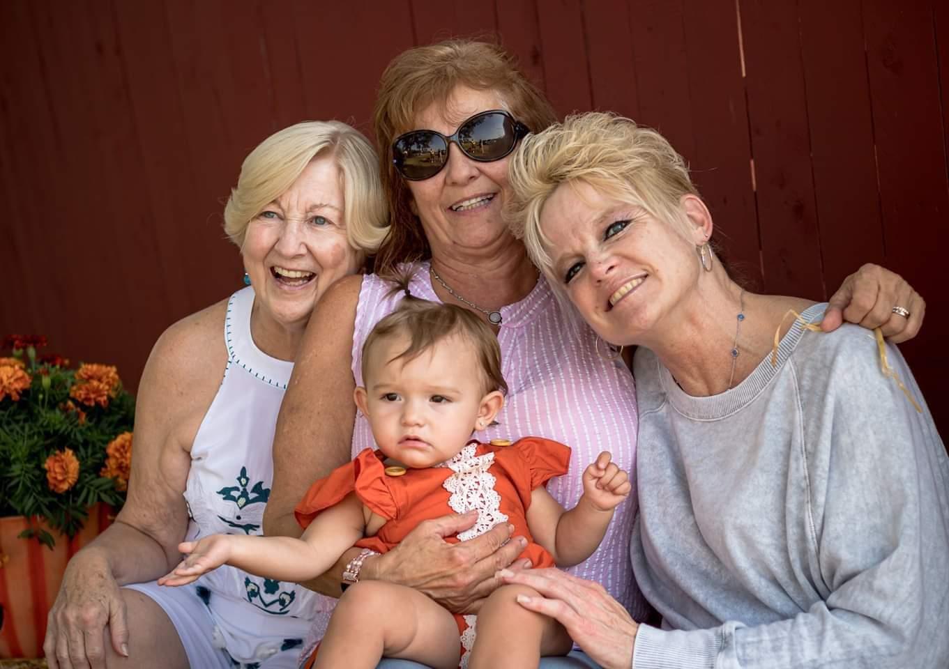 A group of women posing for a picture