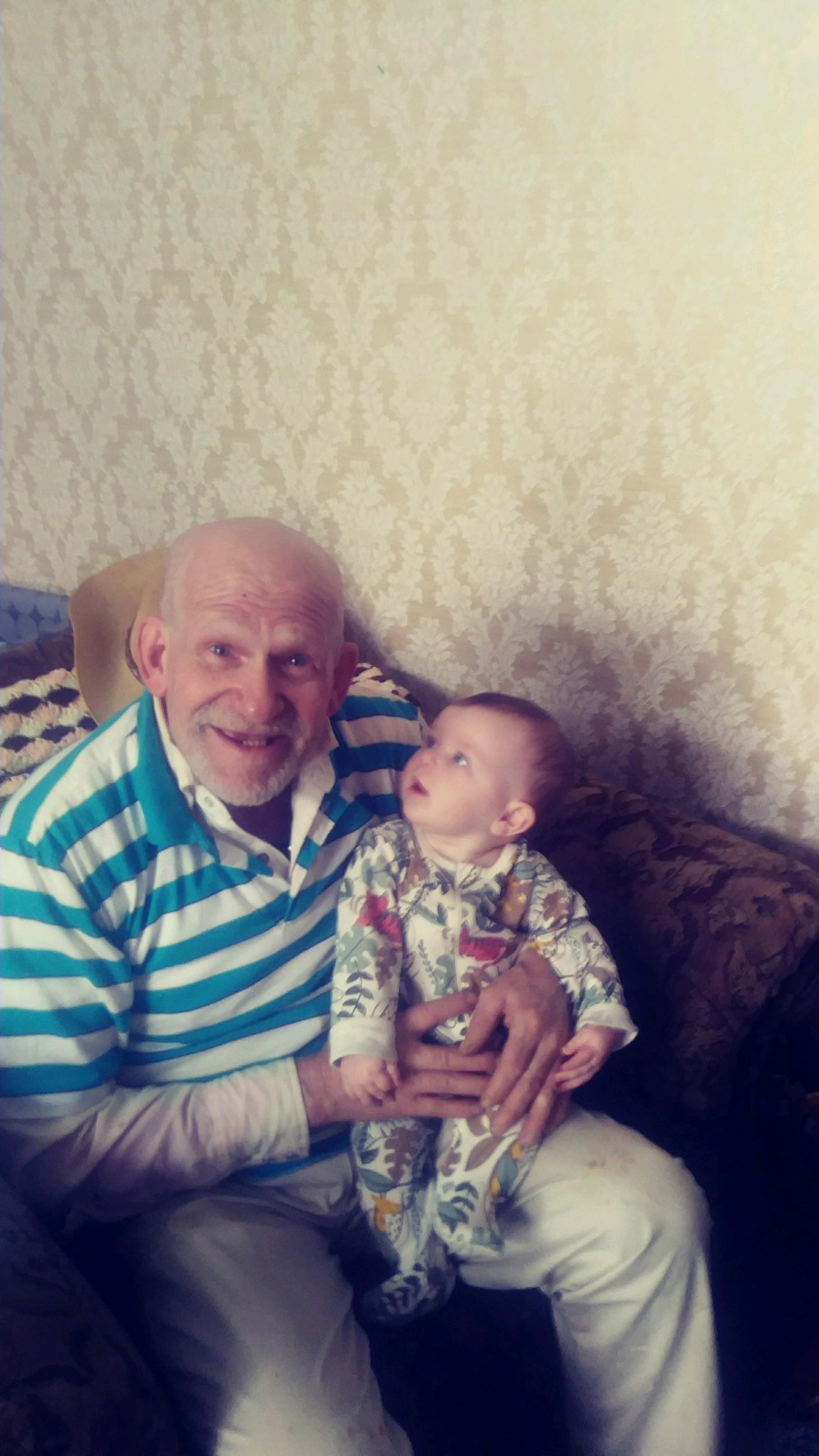 A man holding a baby