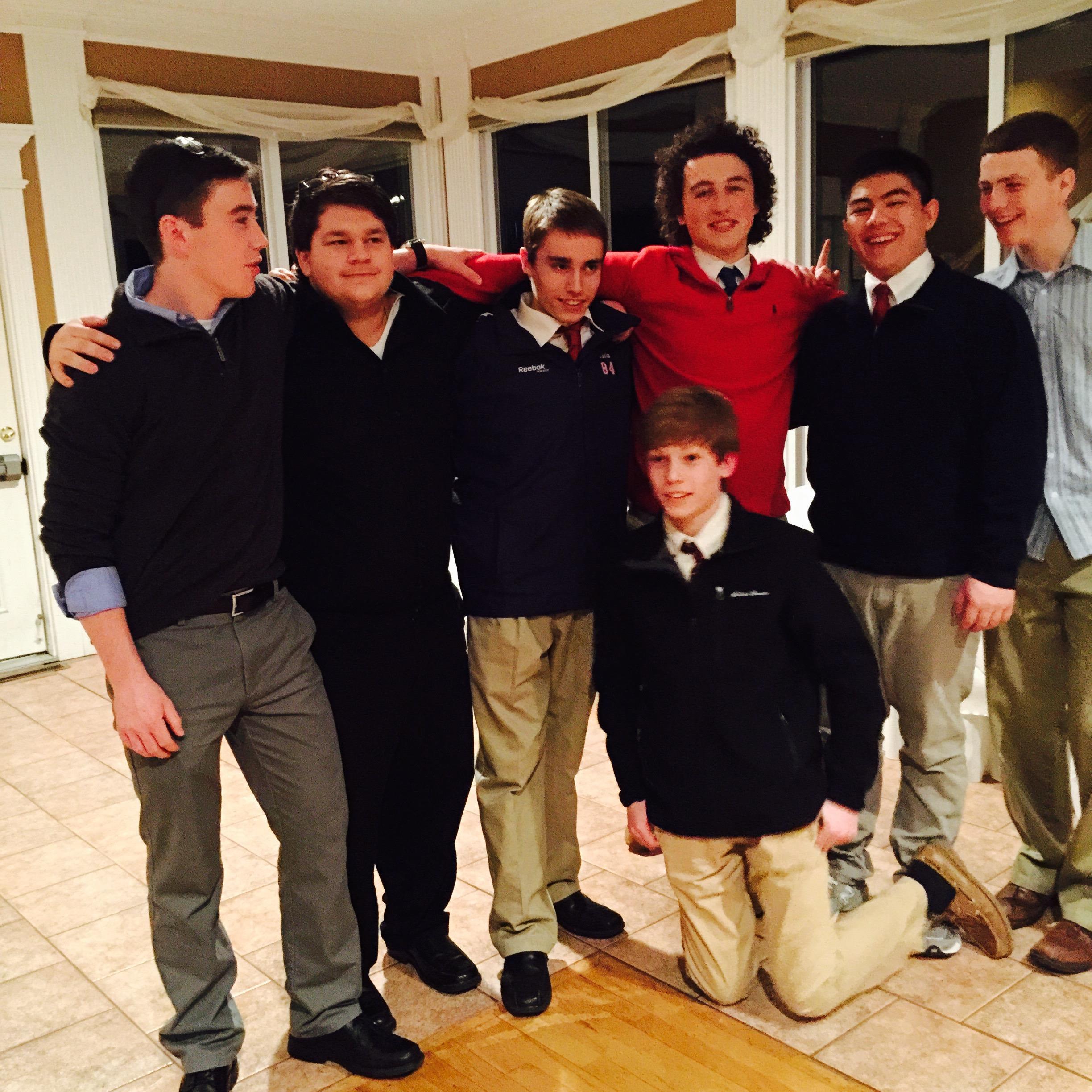 A group of boys posing for a photo