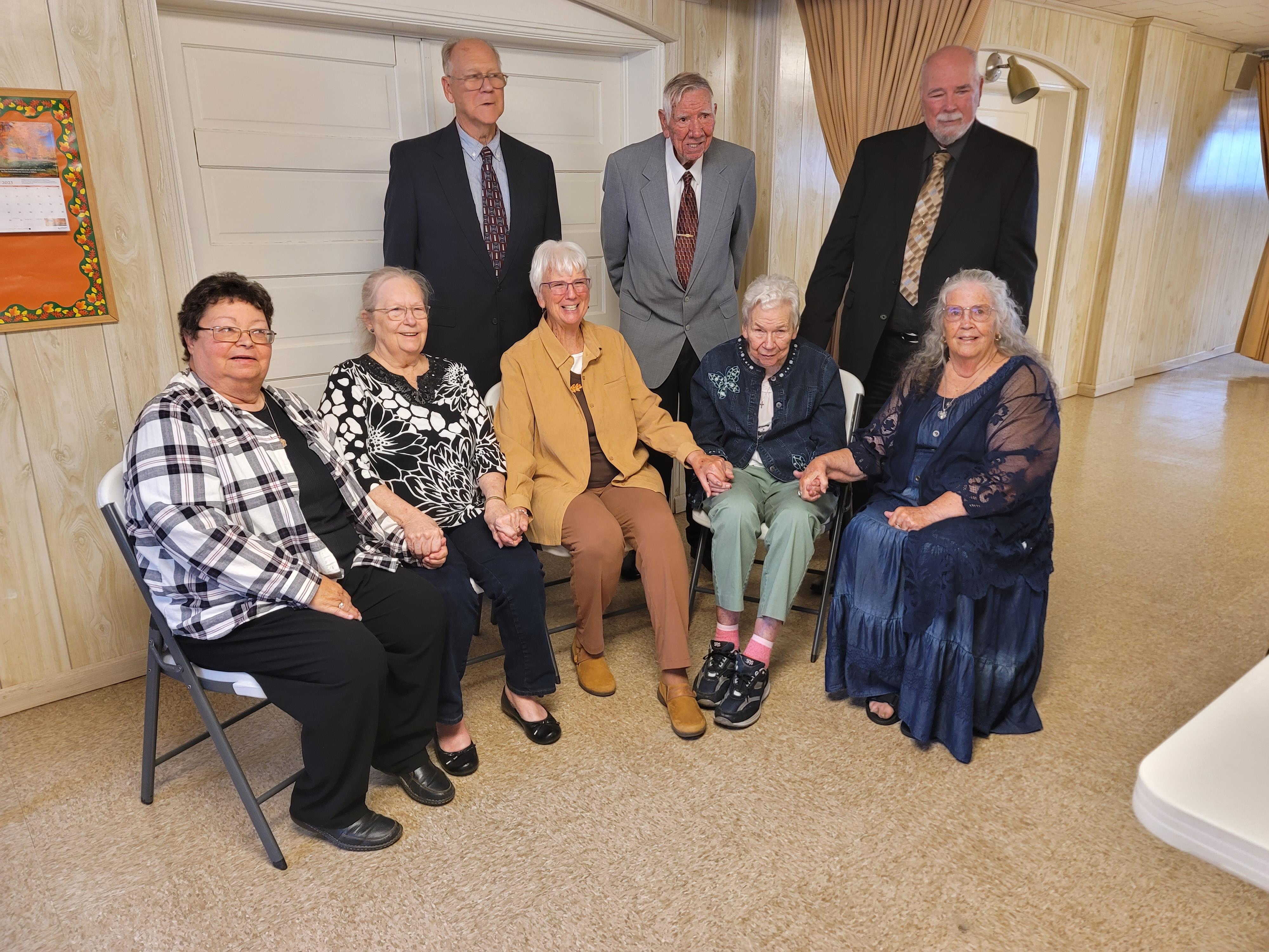 A group of people posing for a photo