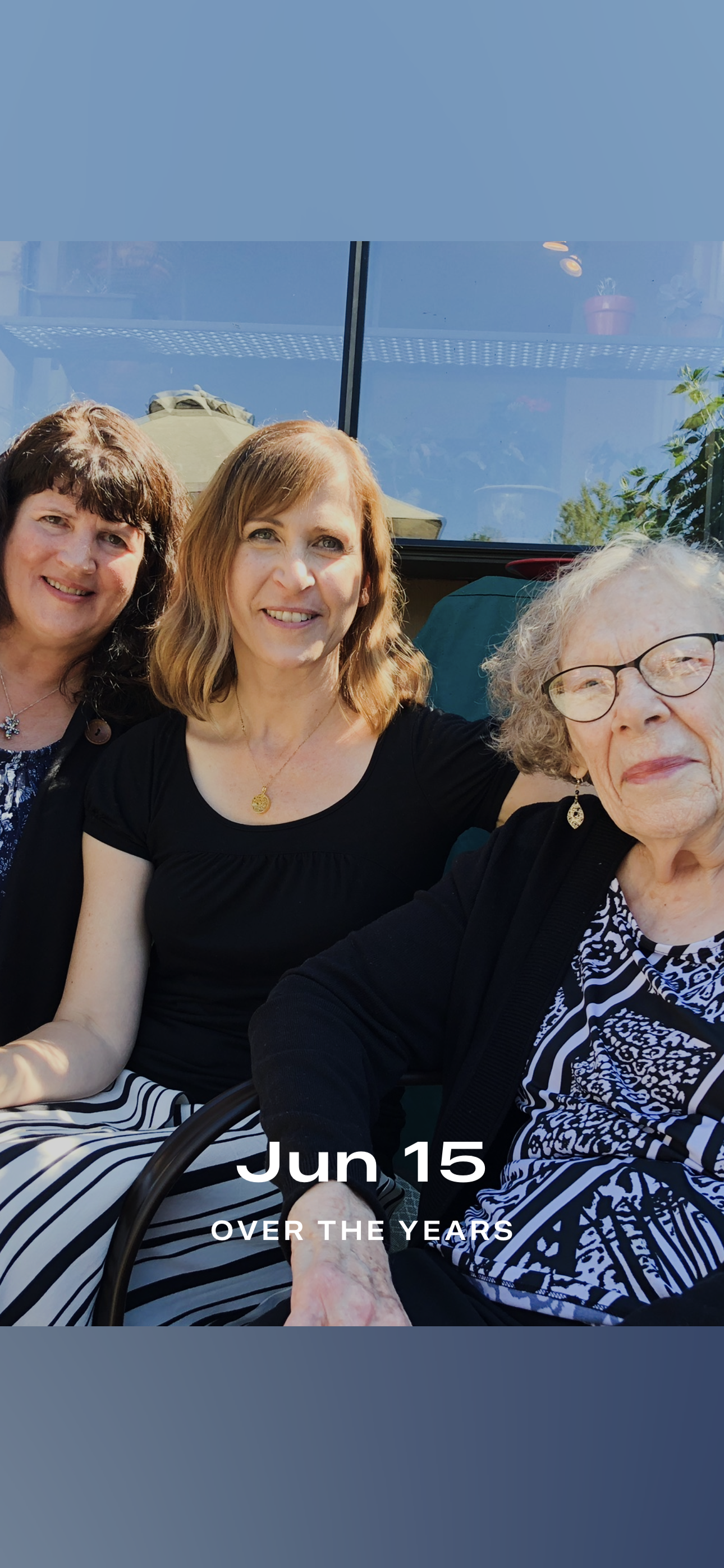 A group of women sitting together smiling