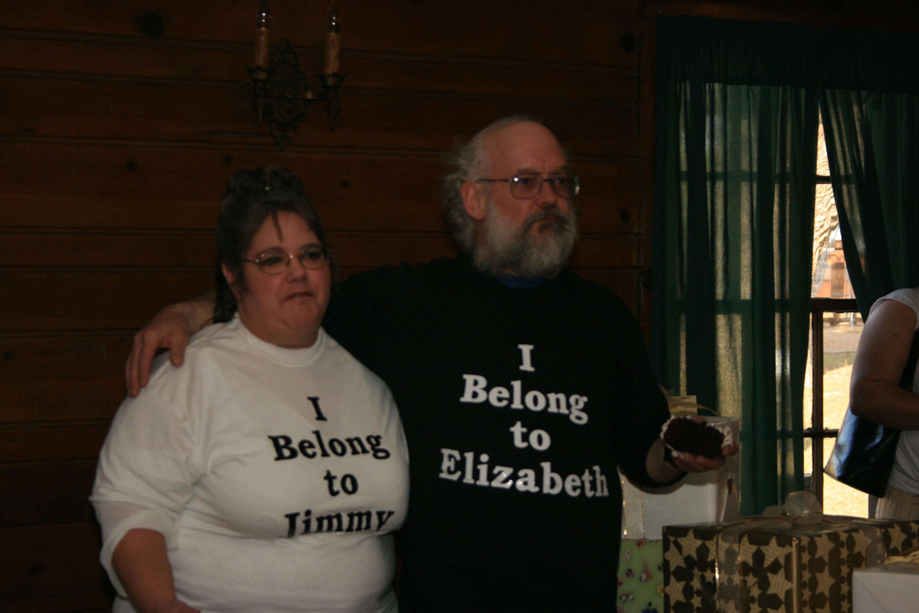 A man and woman standing next to each other
