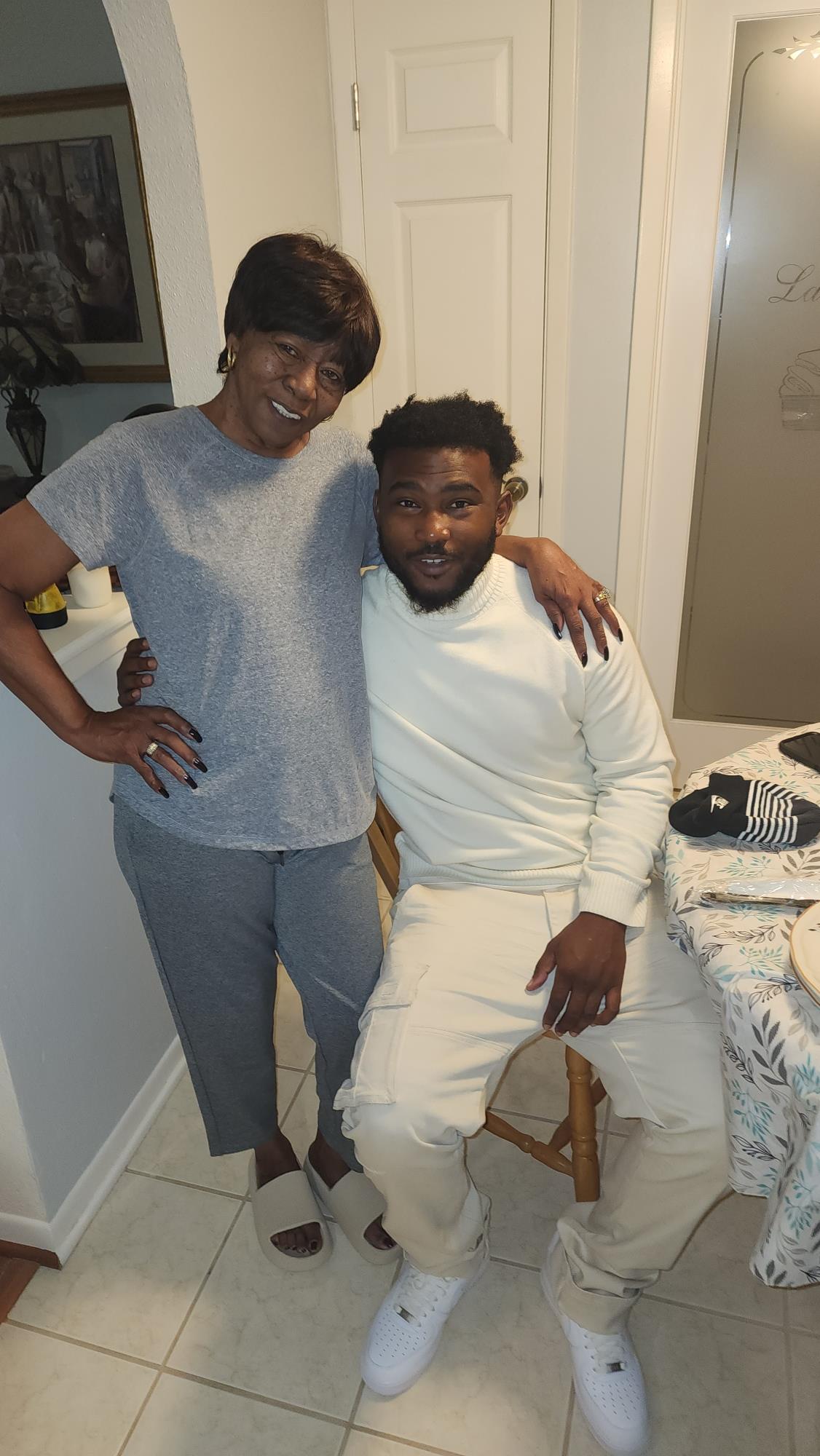 A woman and a man posing for a picture