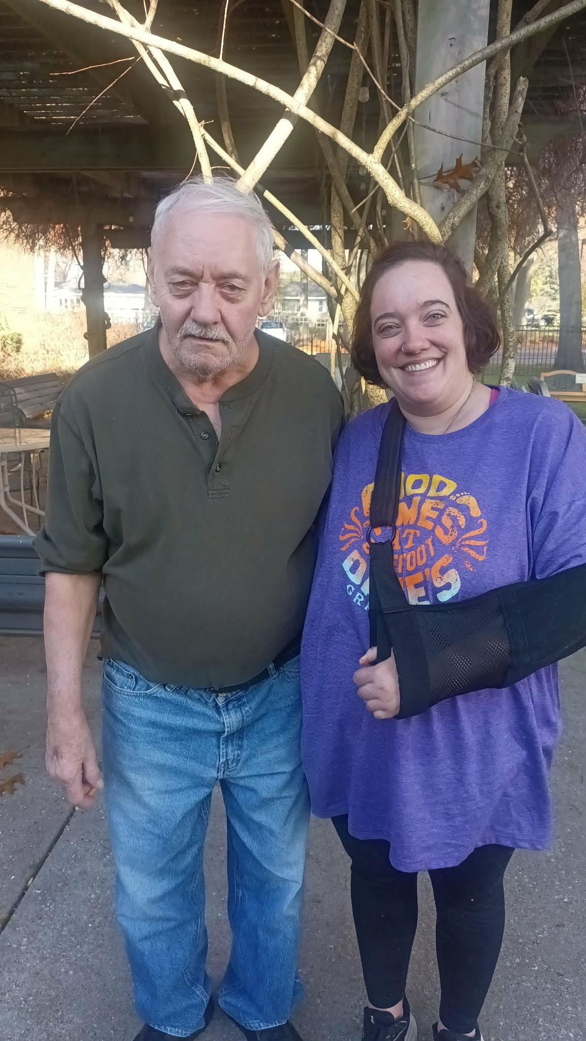 A man and woman standing next to each other