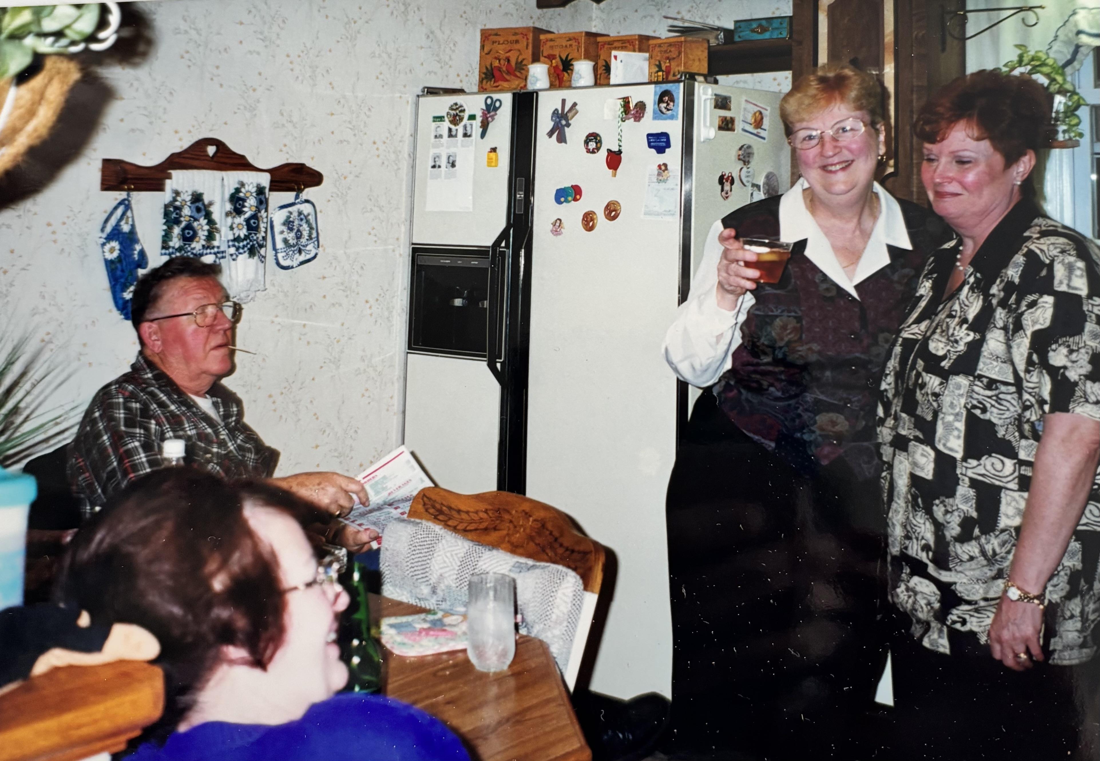 A group of people in a kitchen