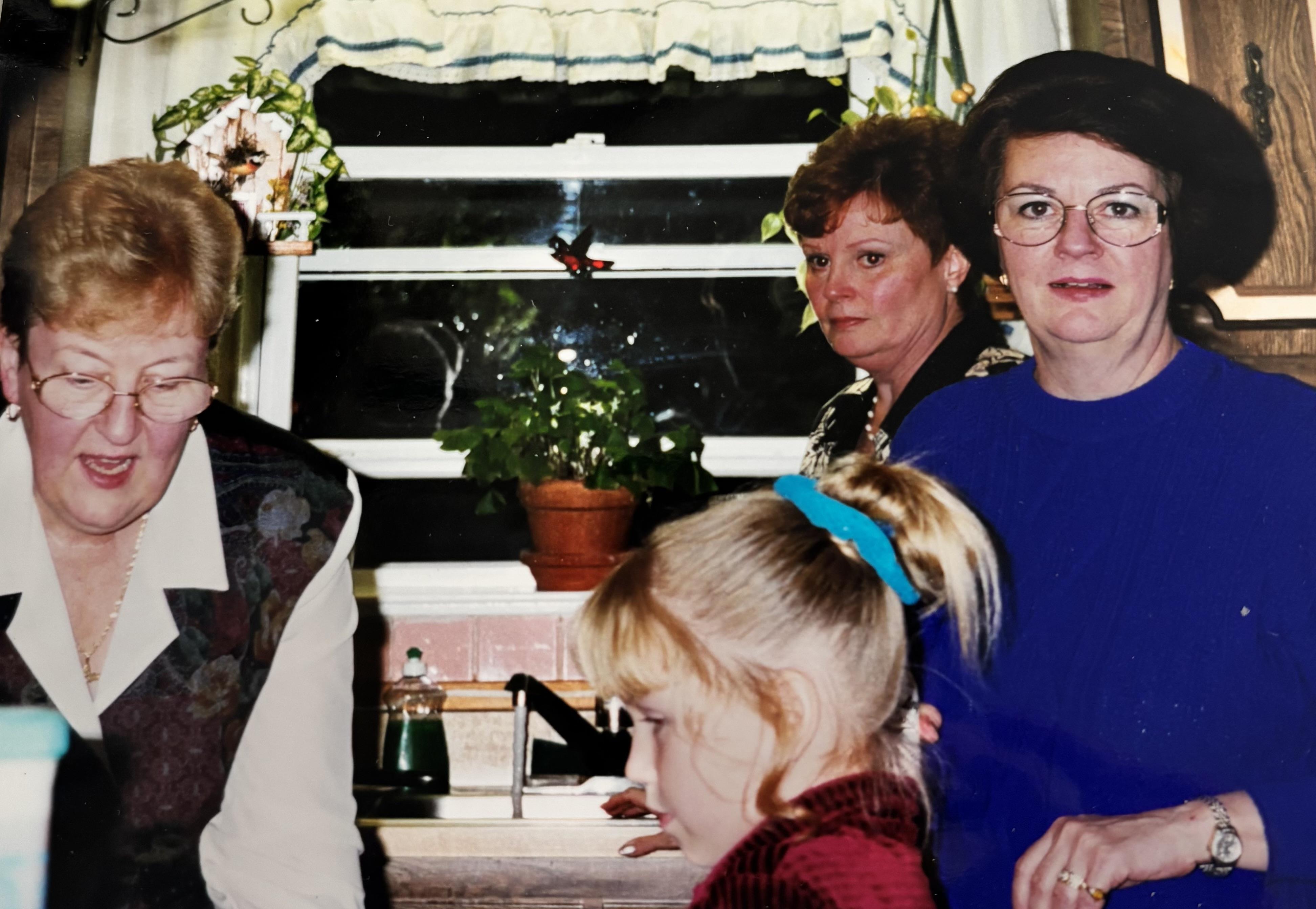 A group of people standing in a room