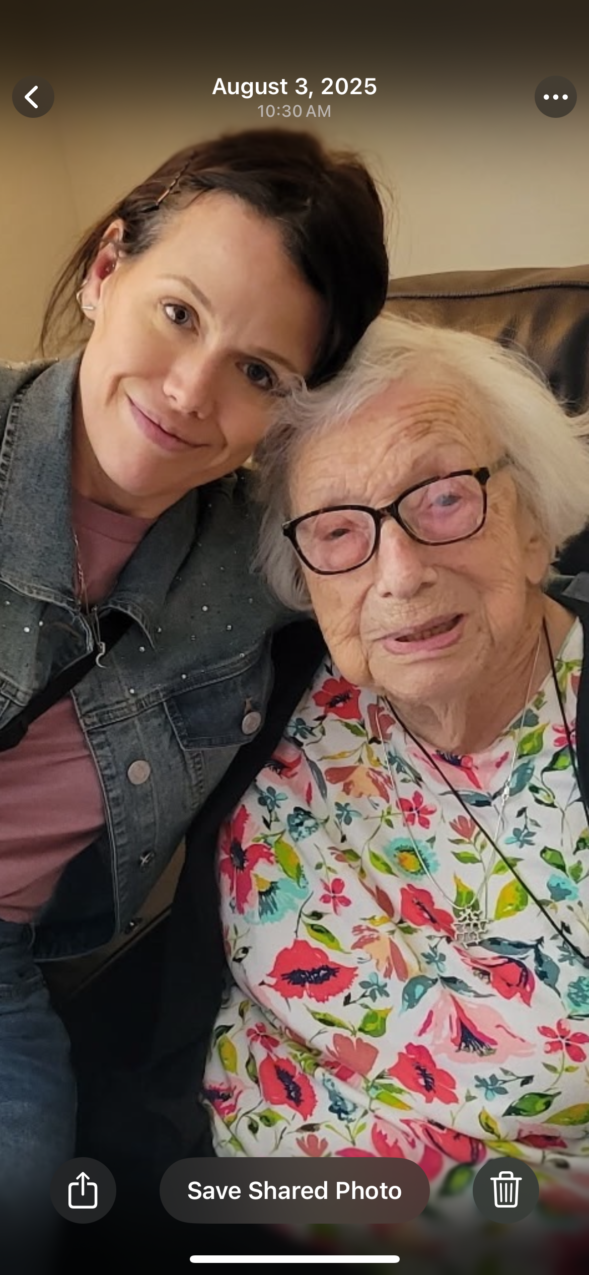 A woman taking a selfie with an elderly woman