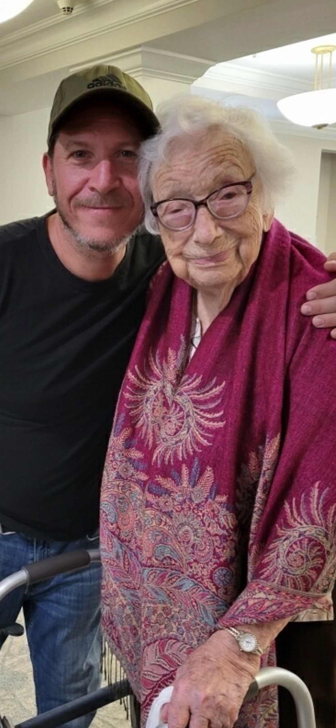 A man and woman posing for a picture