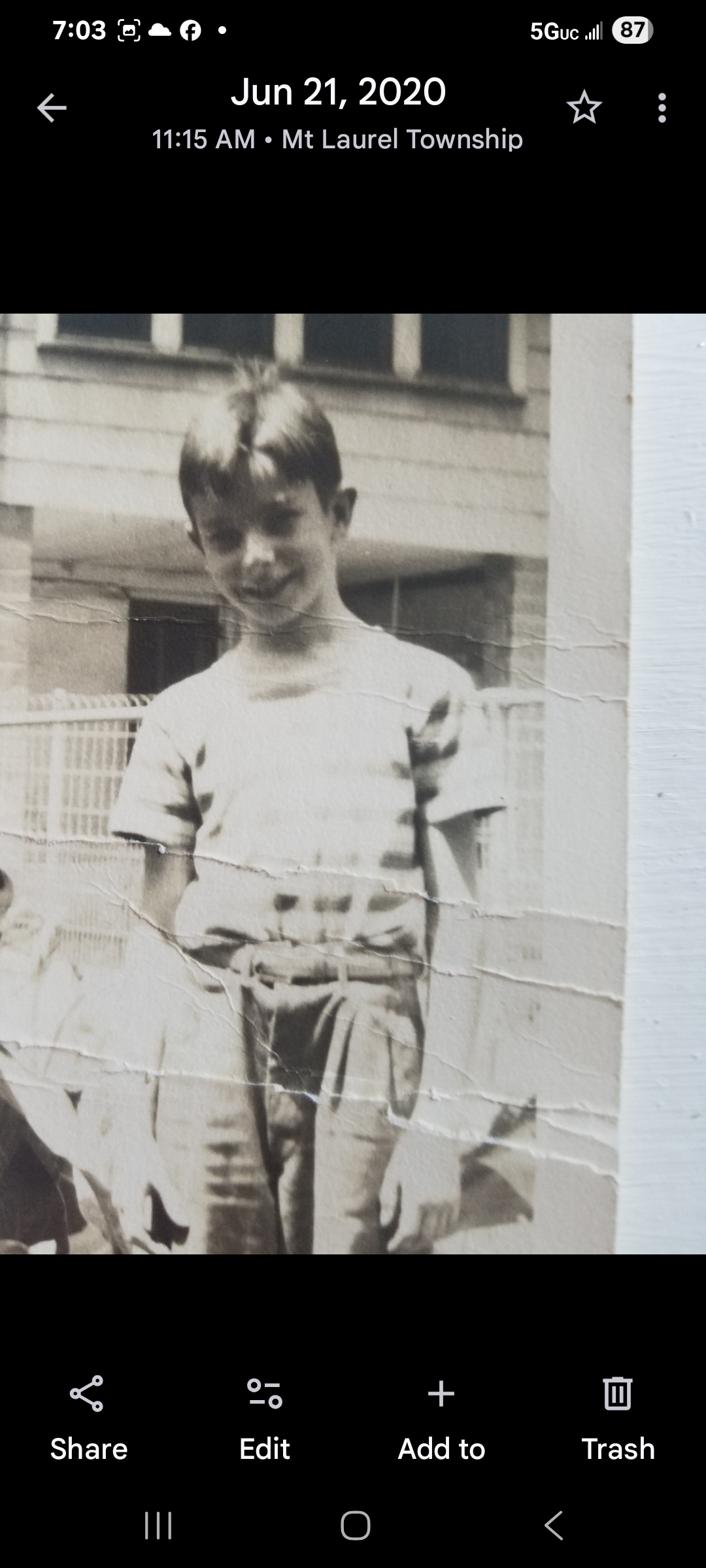 A boy smiling at the camera