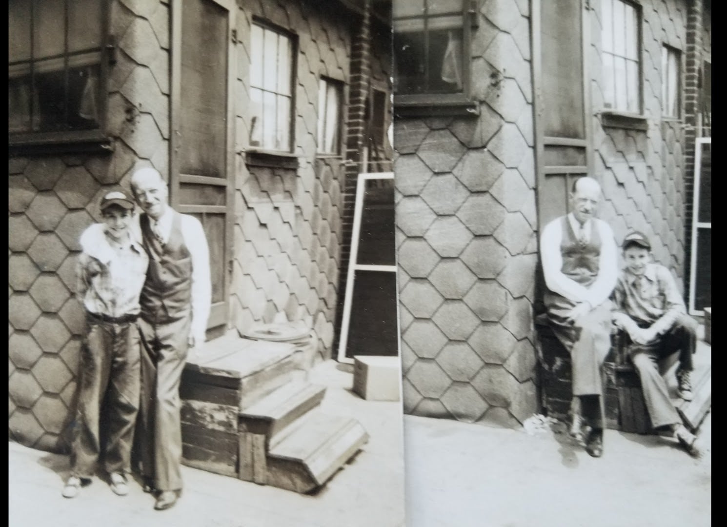 A couple of men standing outside a house
