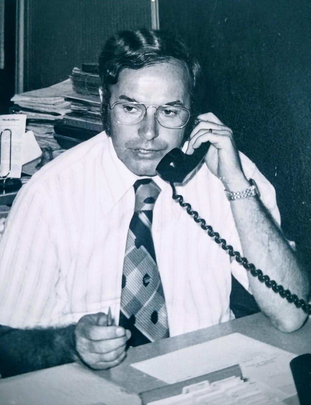 A man holding a telephone