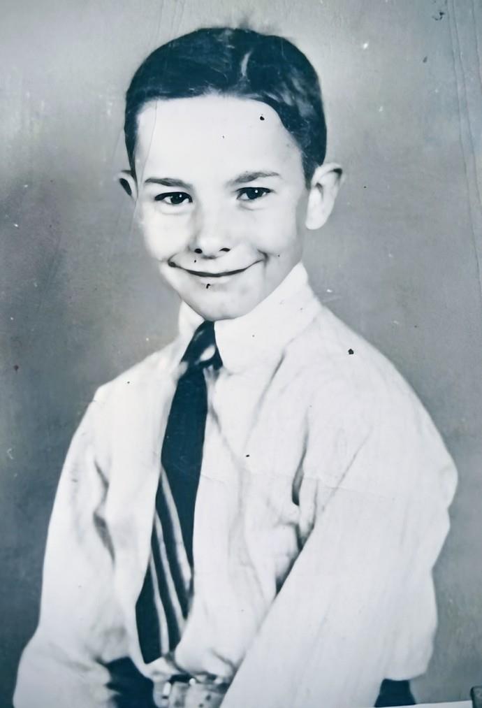 A young boy in a tie