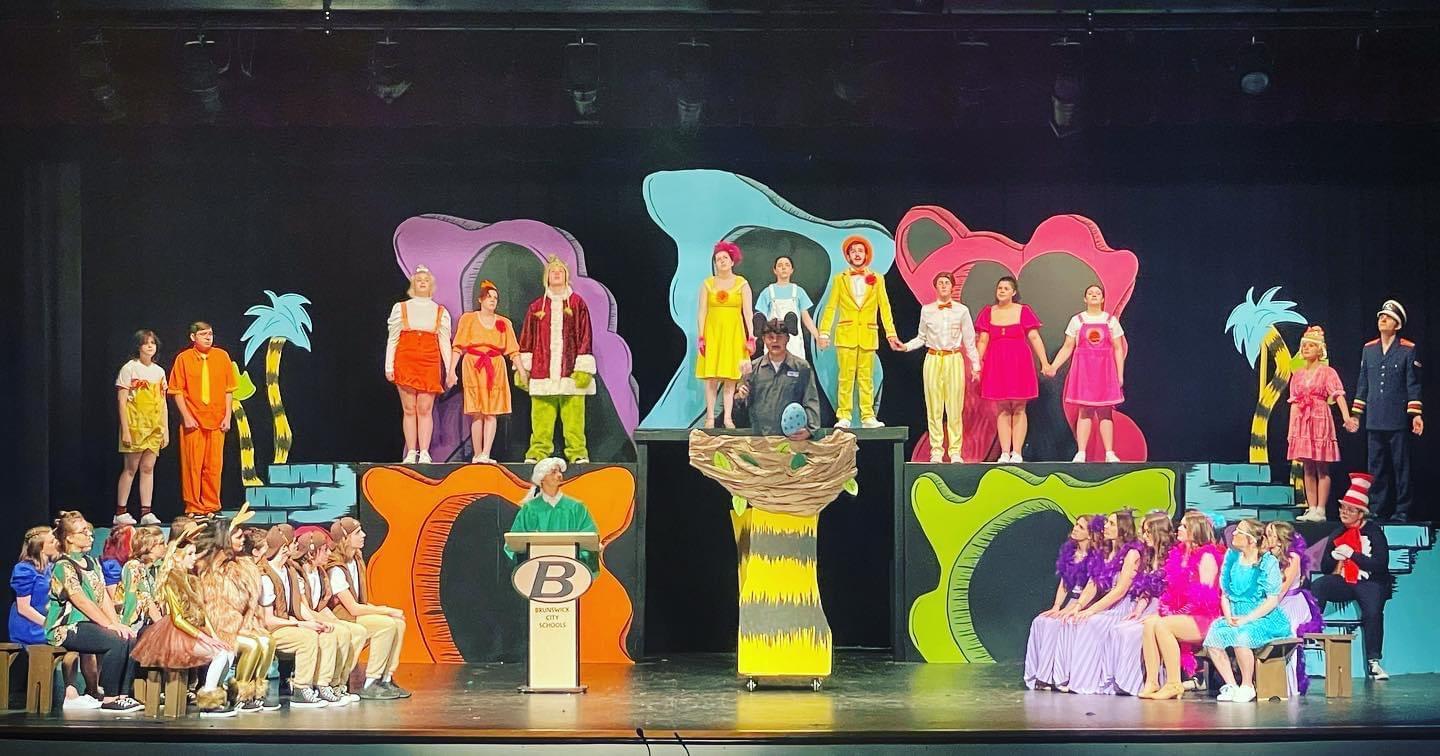 A group of people on stage