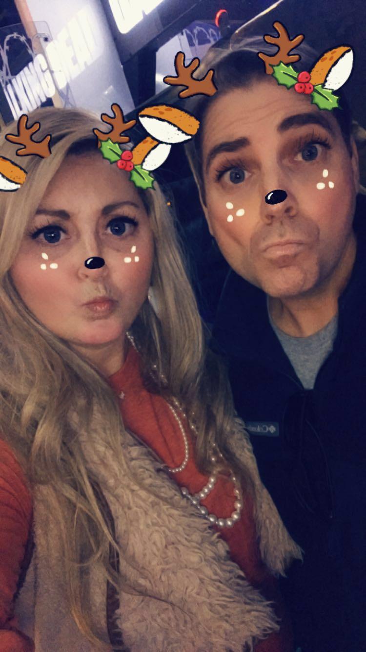 A man and woman taking a selfie