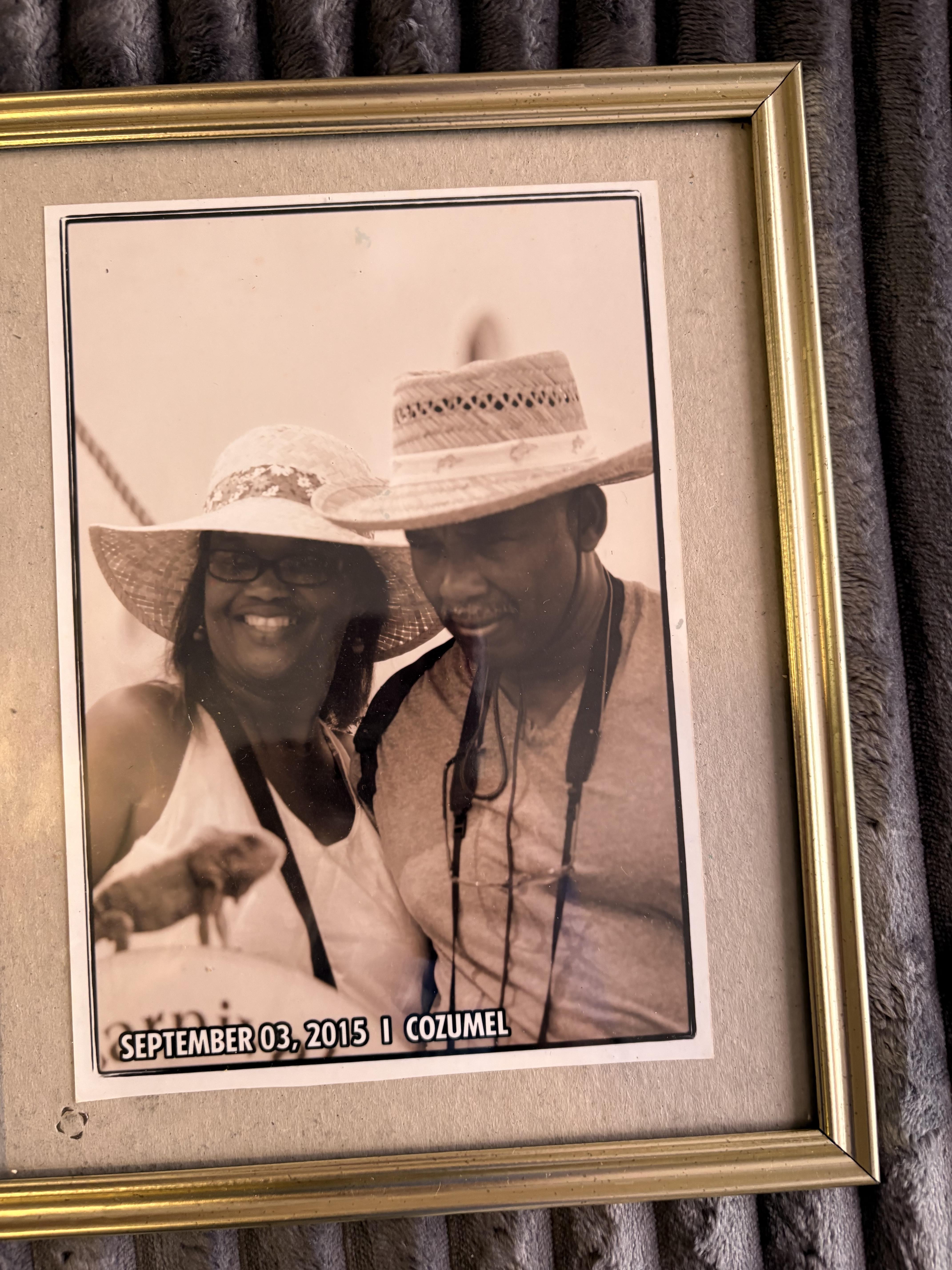 A man and woman in a frame