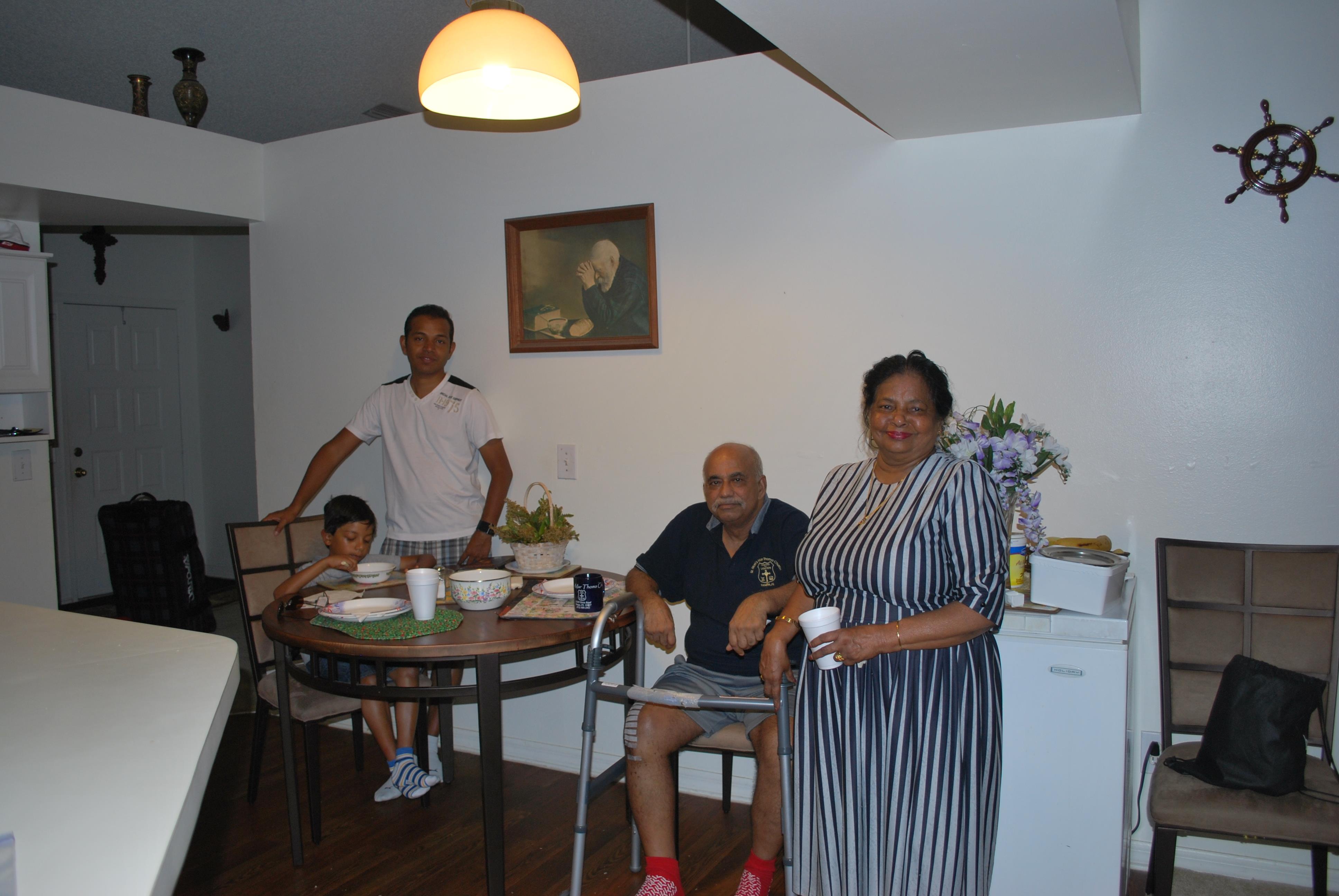 A group of people sitting at a table