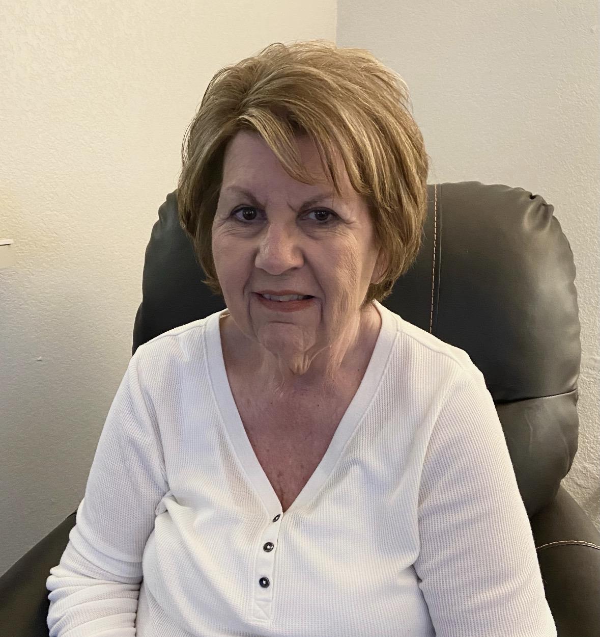 A woman sitting in a chair