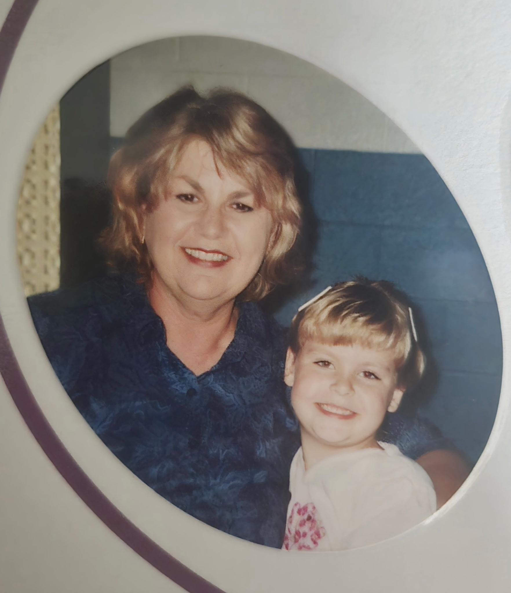 A woman and child posing for a picture