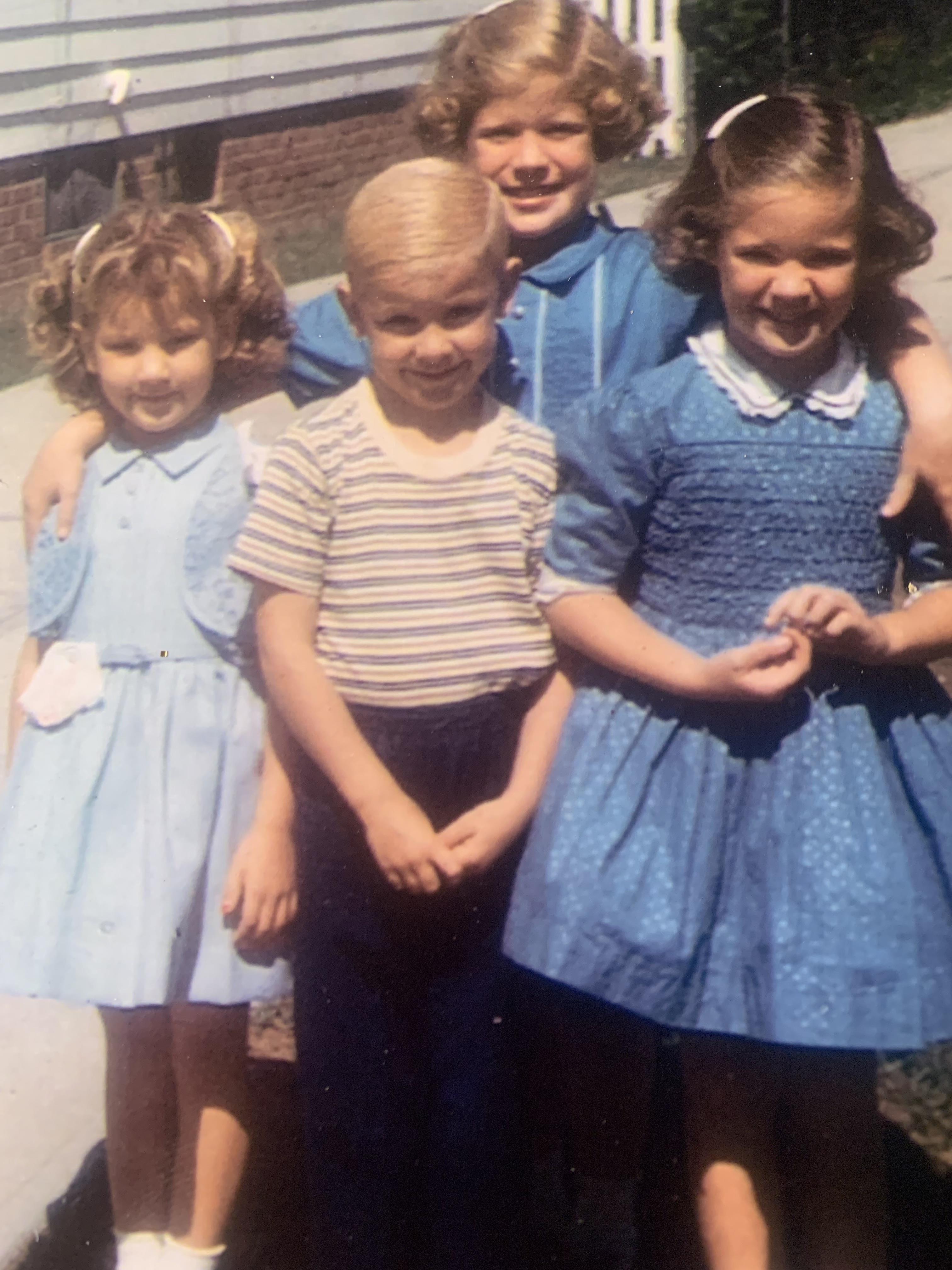 A group of children posing for a photo