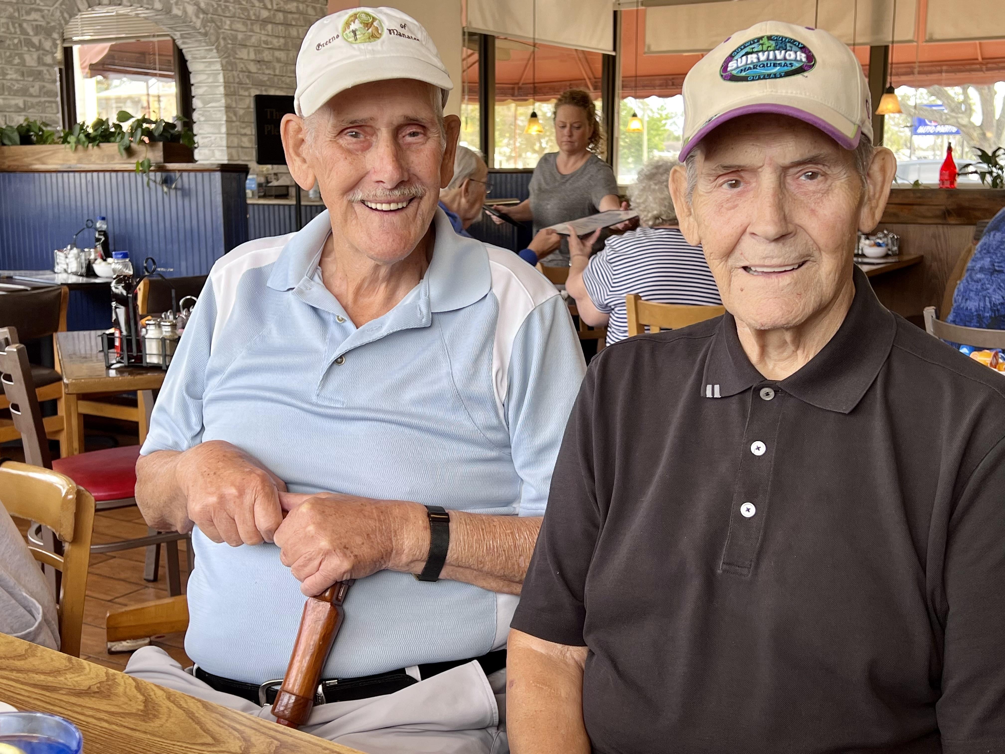 Two men sitting at a table