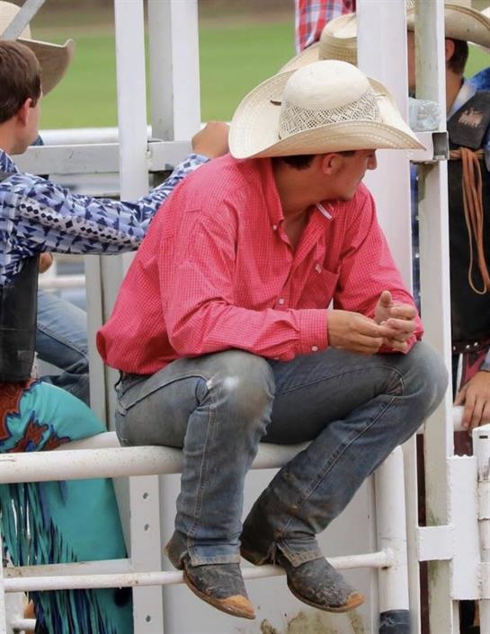 A man wearing a cowboy hat