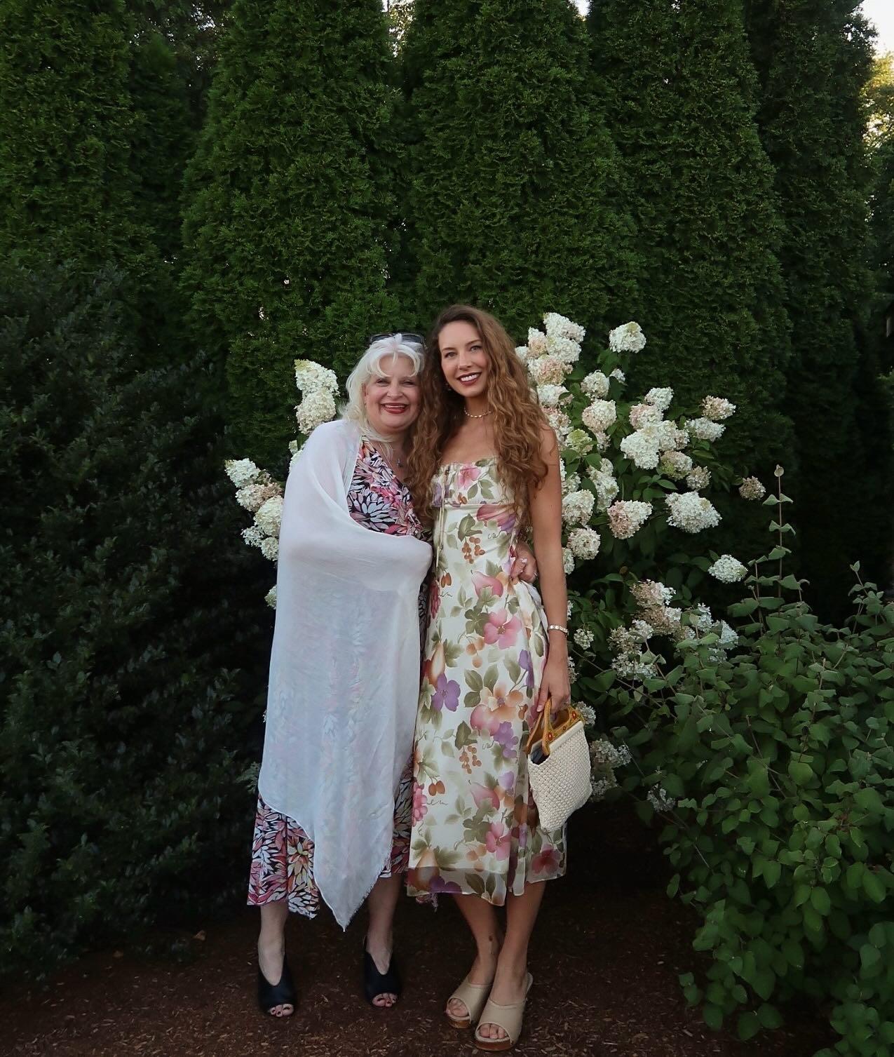 Two women standing next to each other