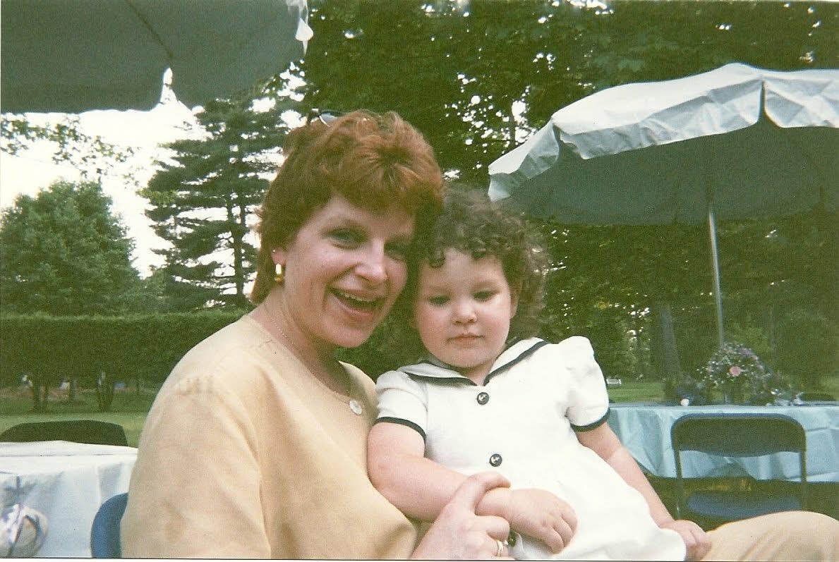 A woman holding a baby