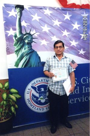 A man holding a certificate