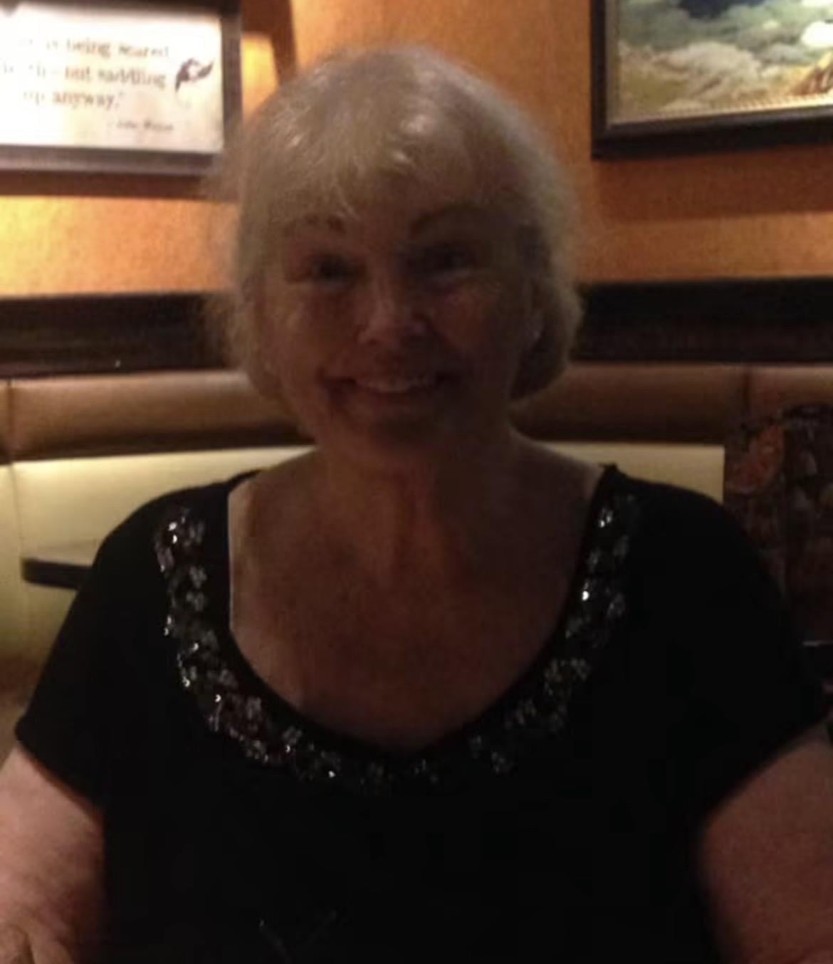 A woman sitting at a table
