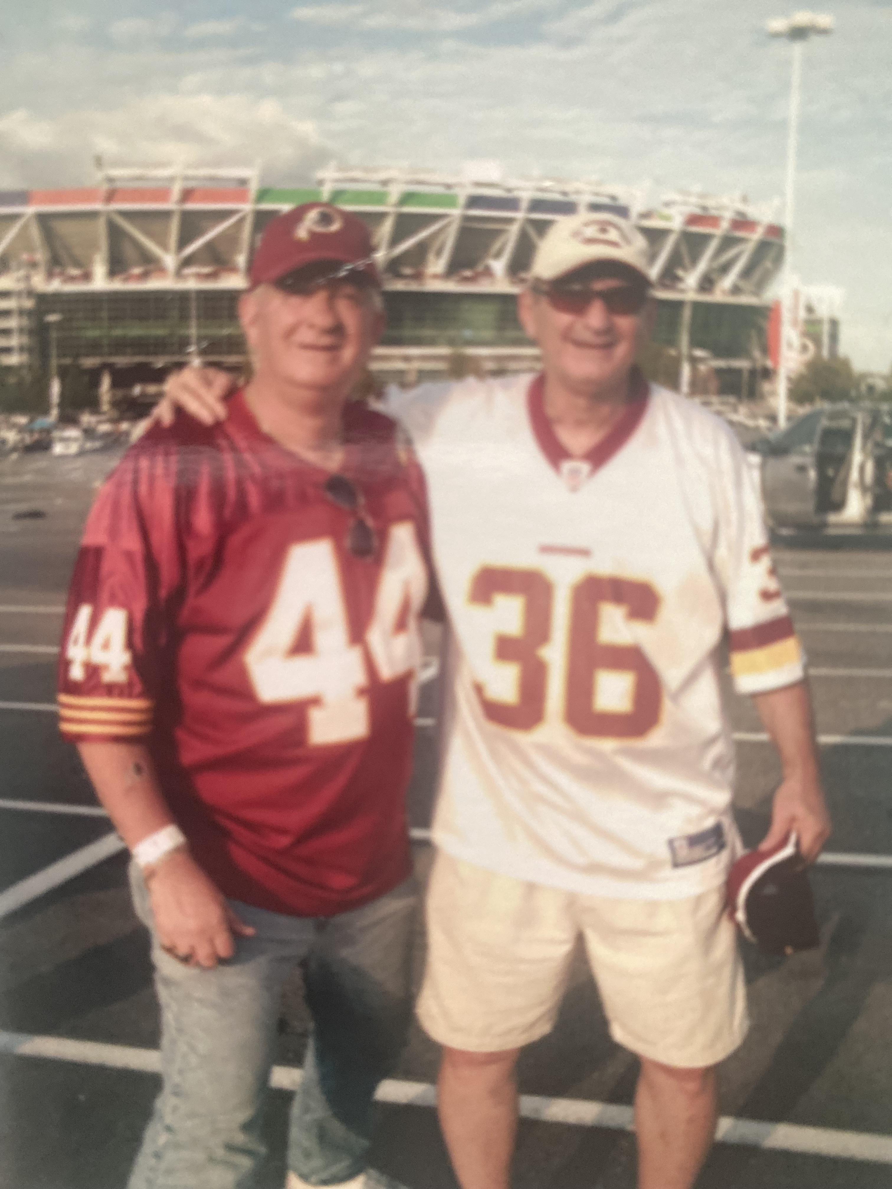 Two men standing next to each other