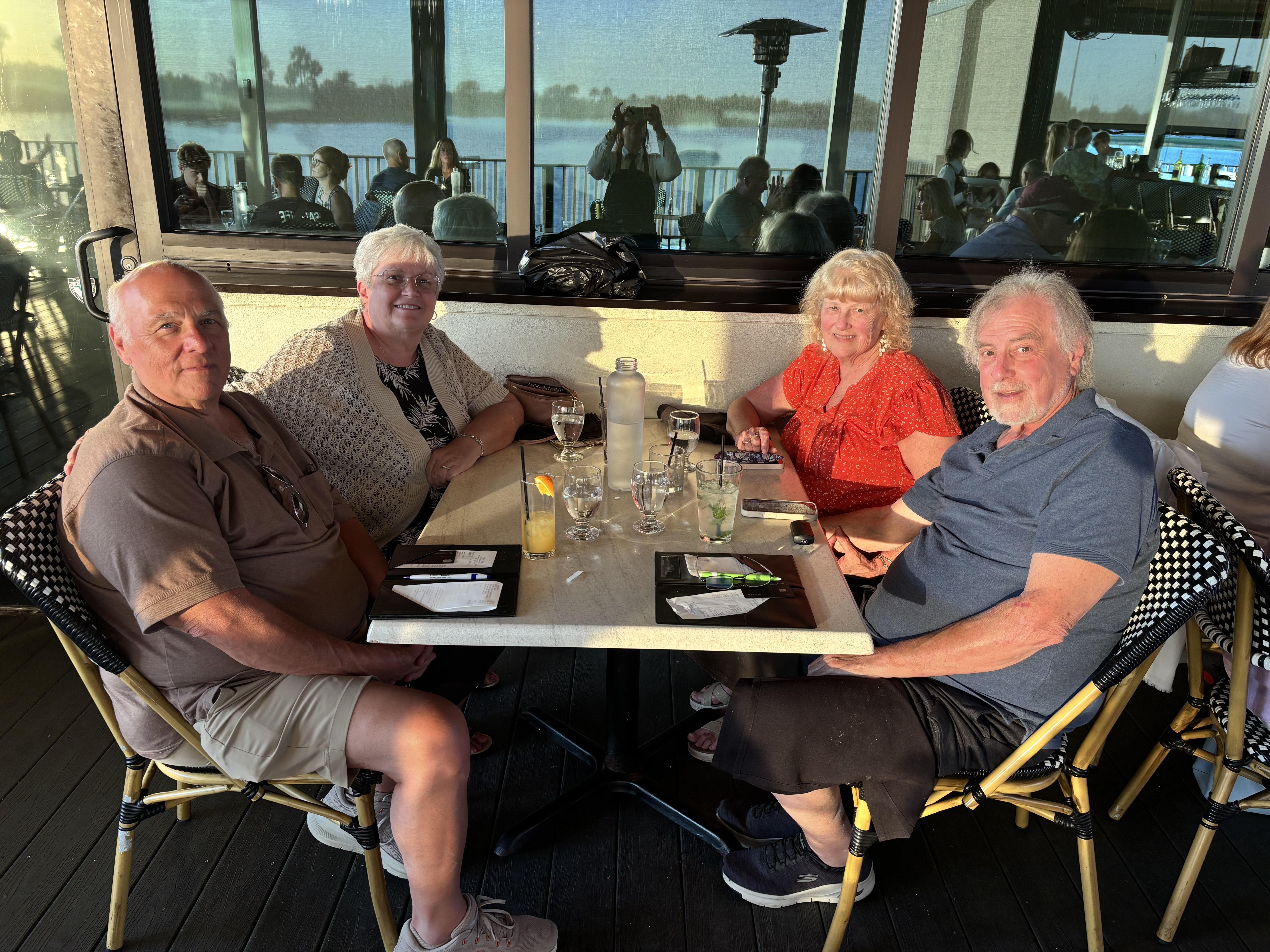 A group of people sitting at a table
