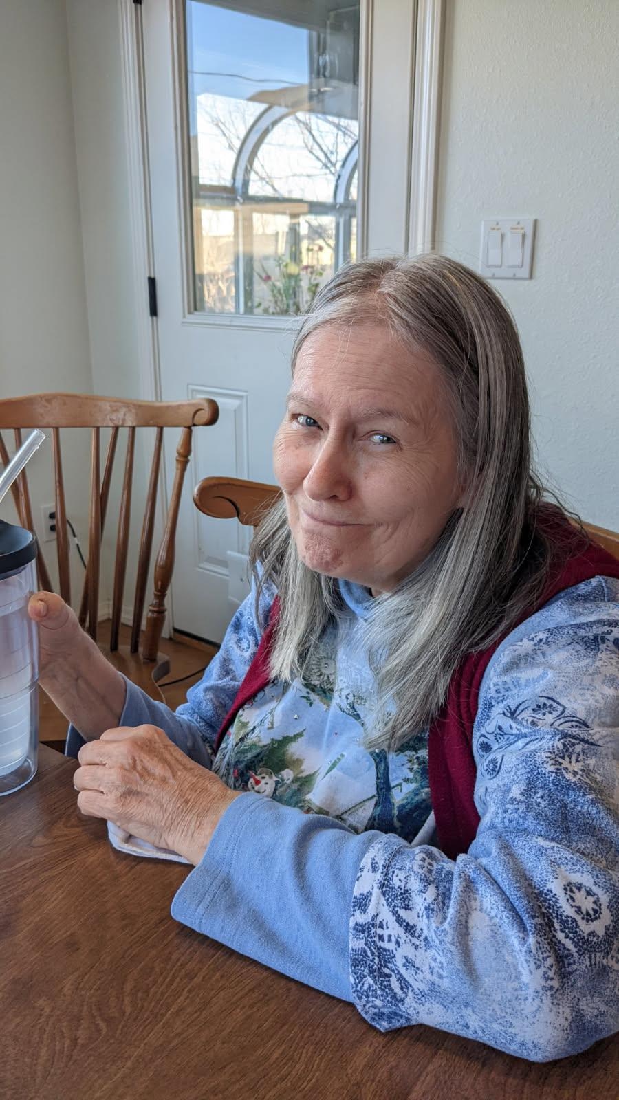A woman sitting at a table