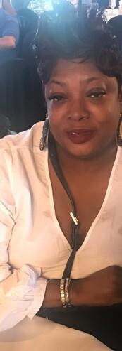 A woman wearing a white shirt