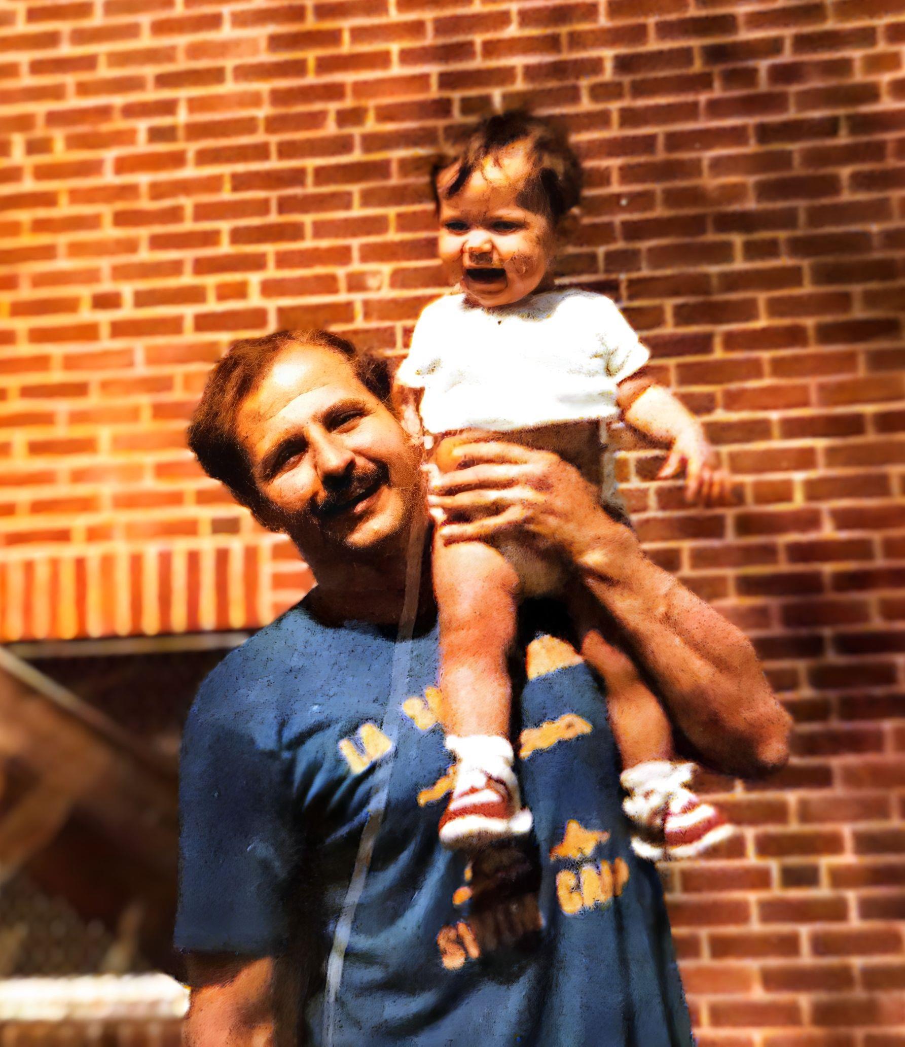 A man holding a baby