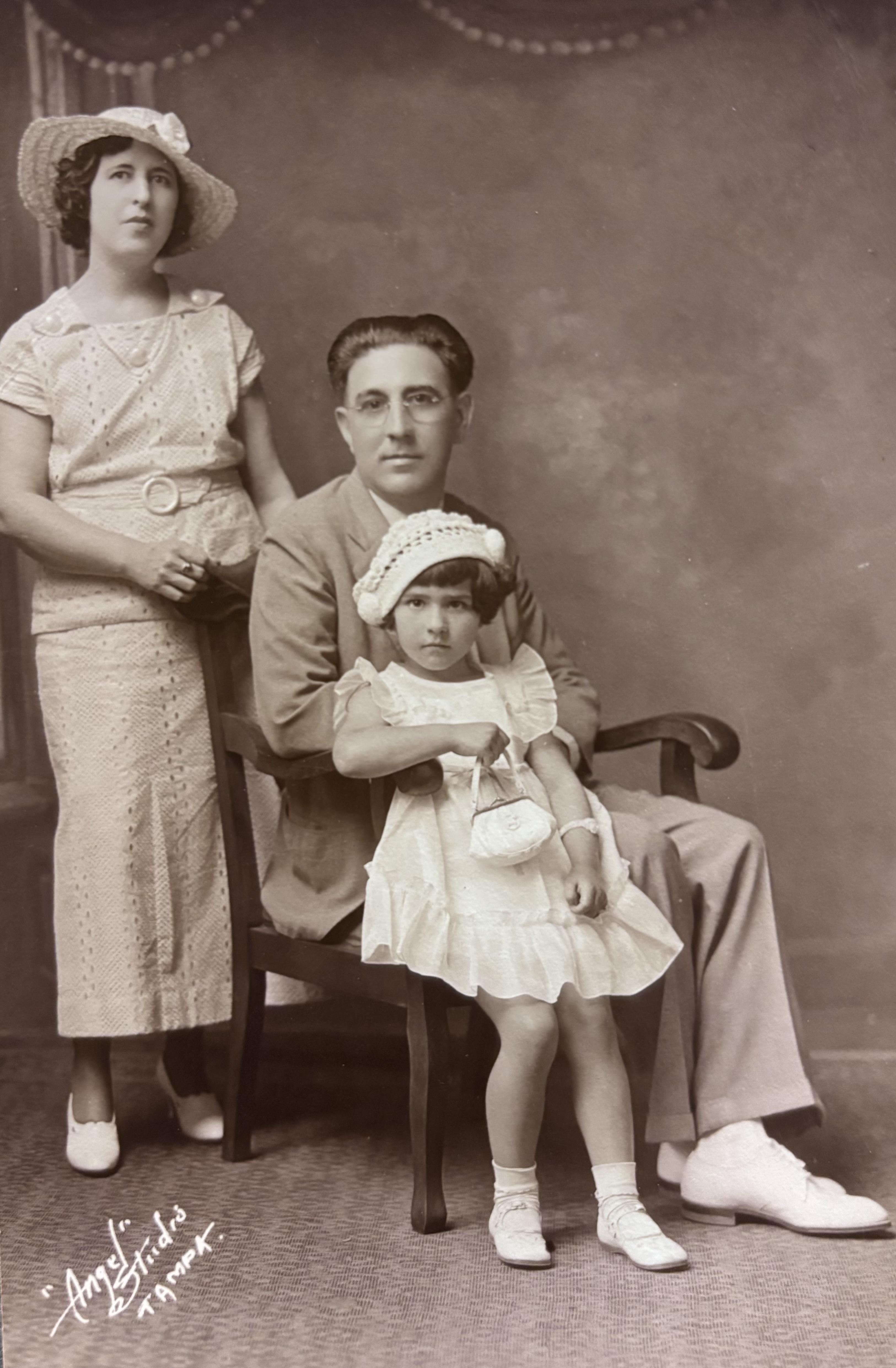 A man and woman posing for a picture