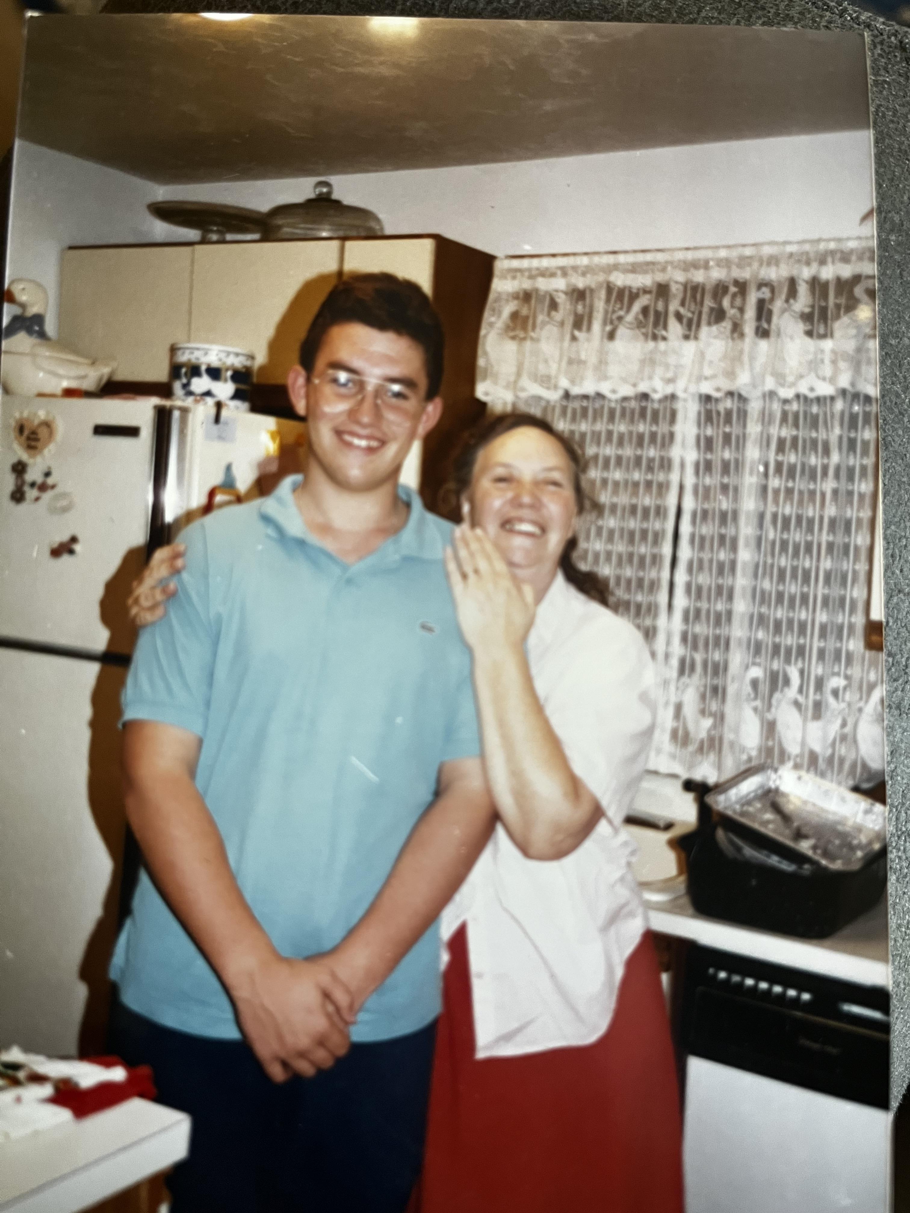 A man and woman in a kitchen