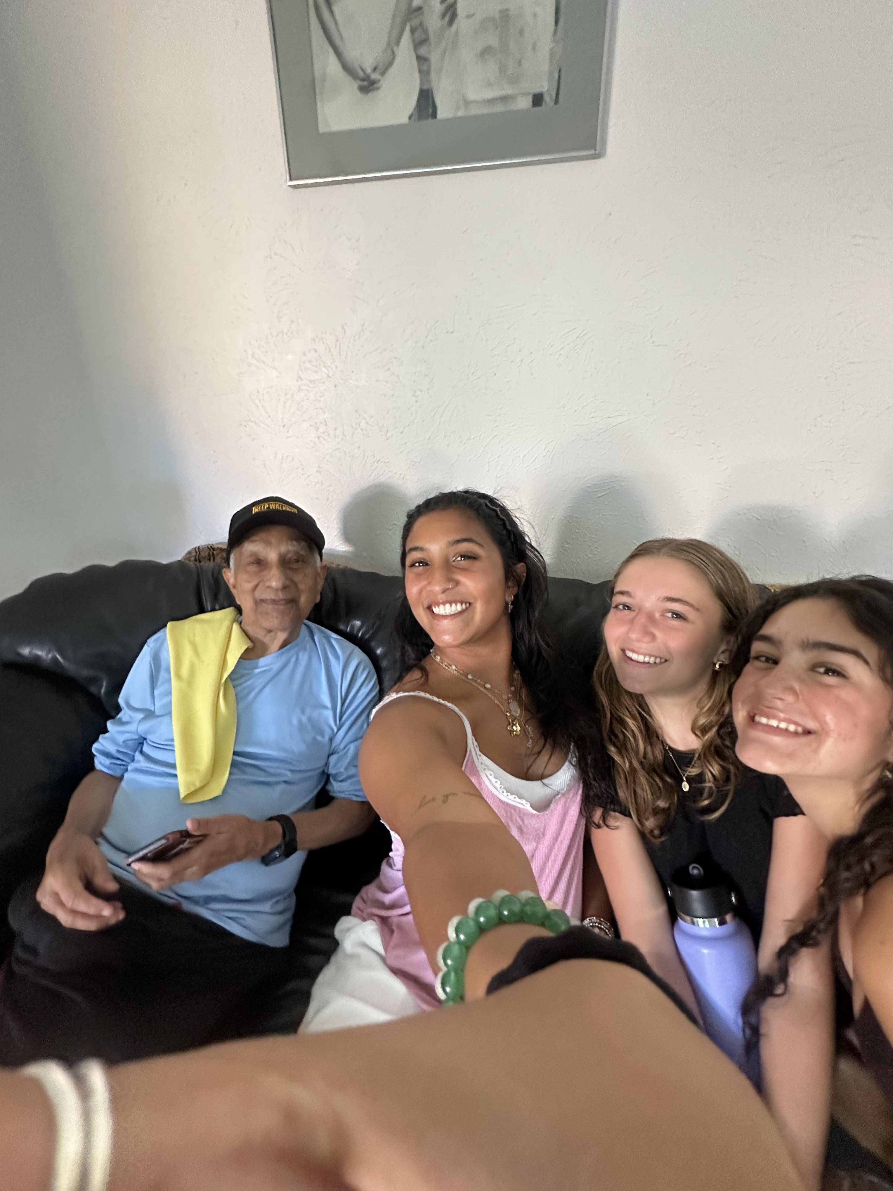 A group of people sitting on a couch