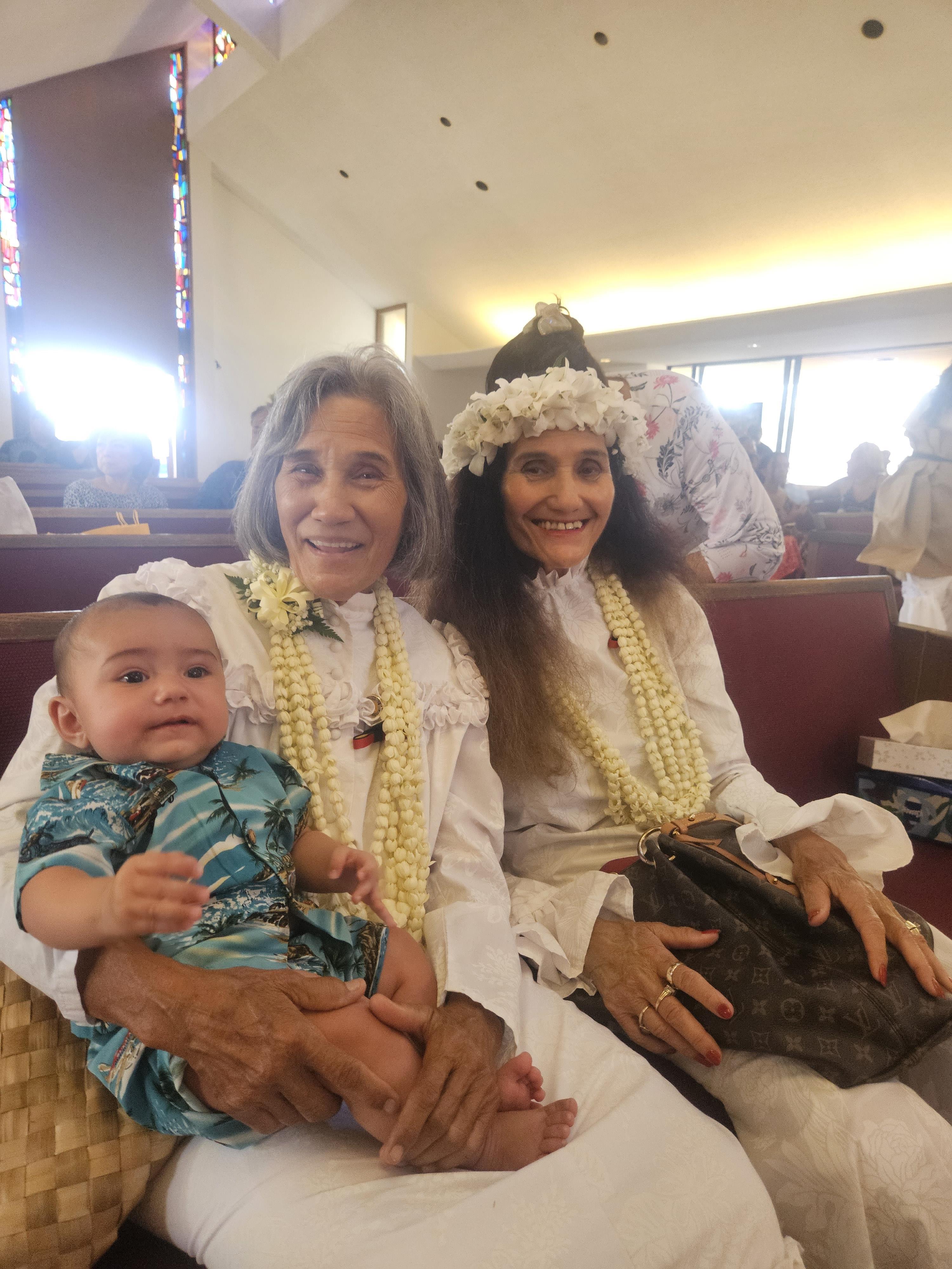 A group of women and a baby