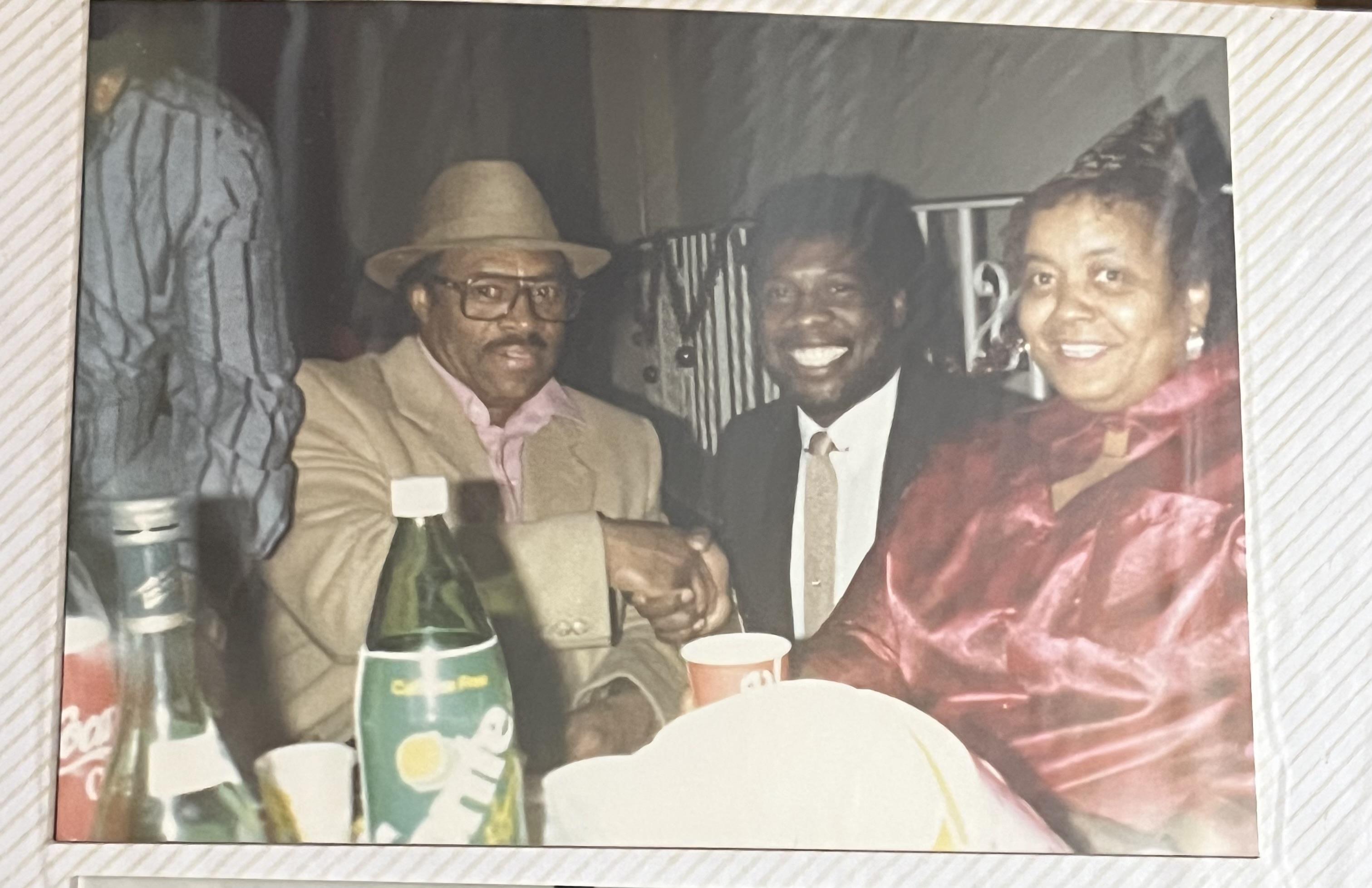 A group of people sitting at a table