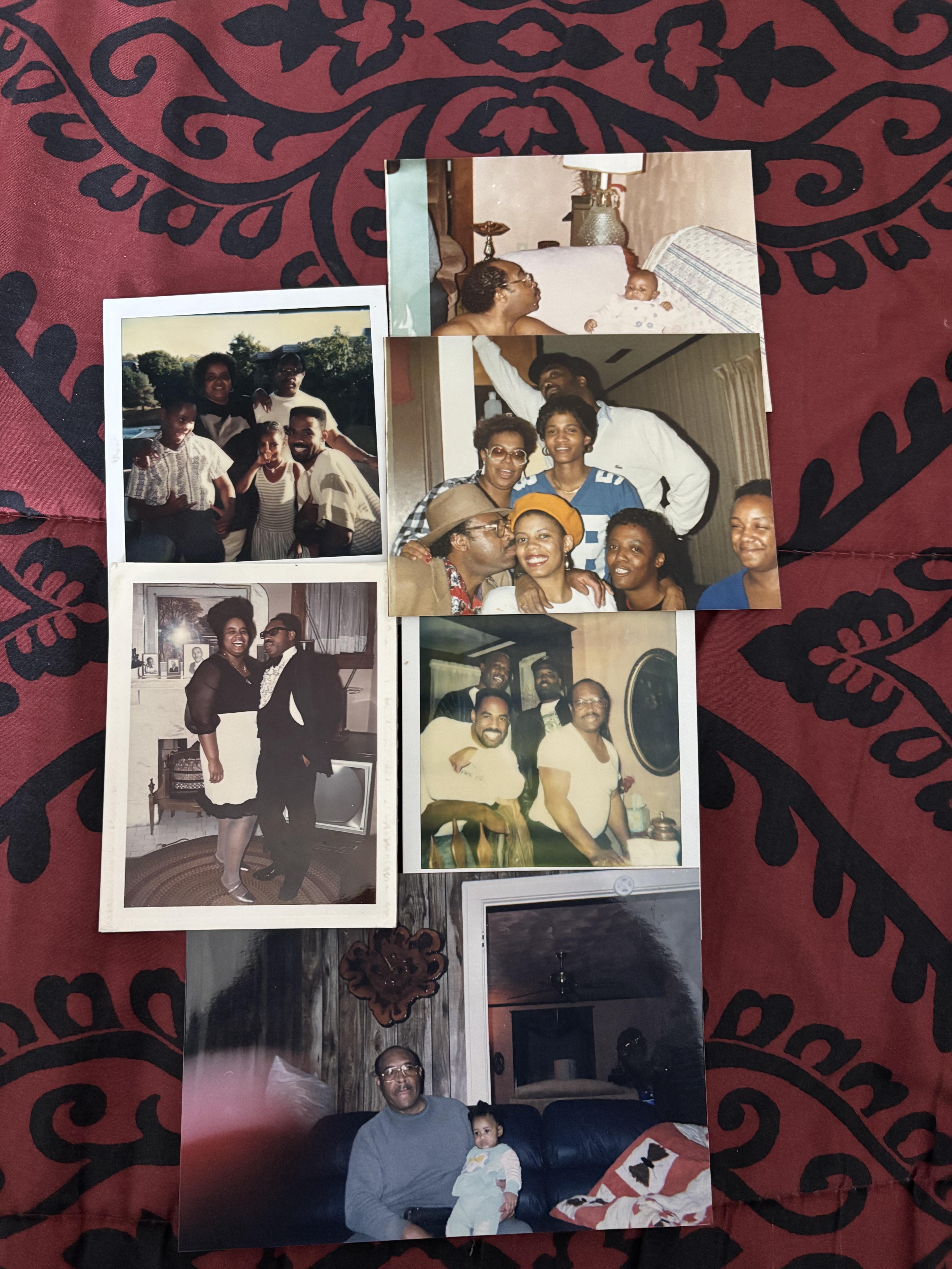 A group of photos on a red and black surface
