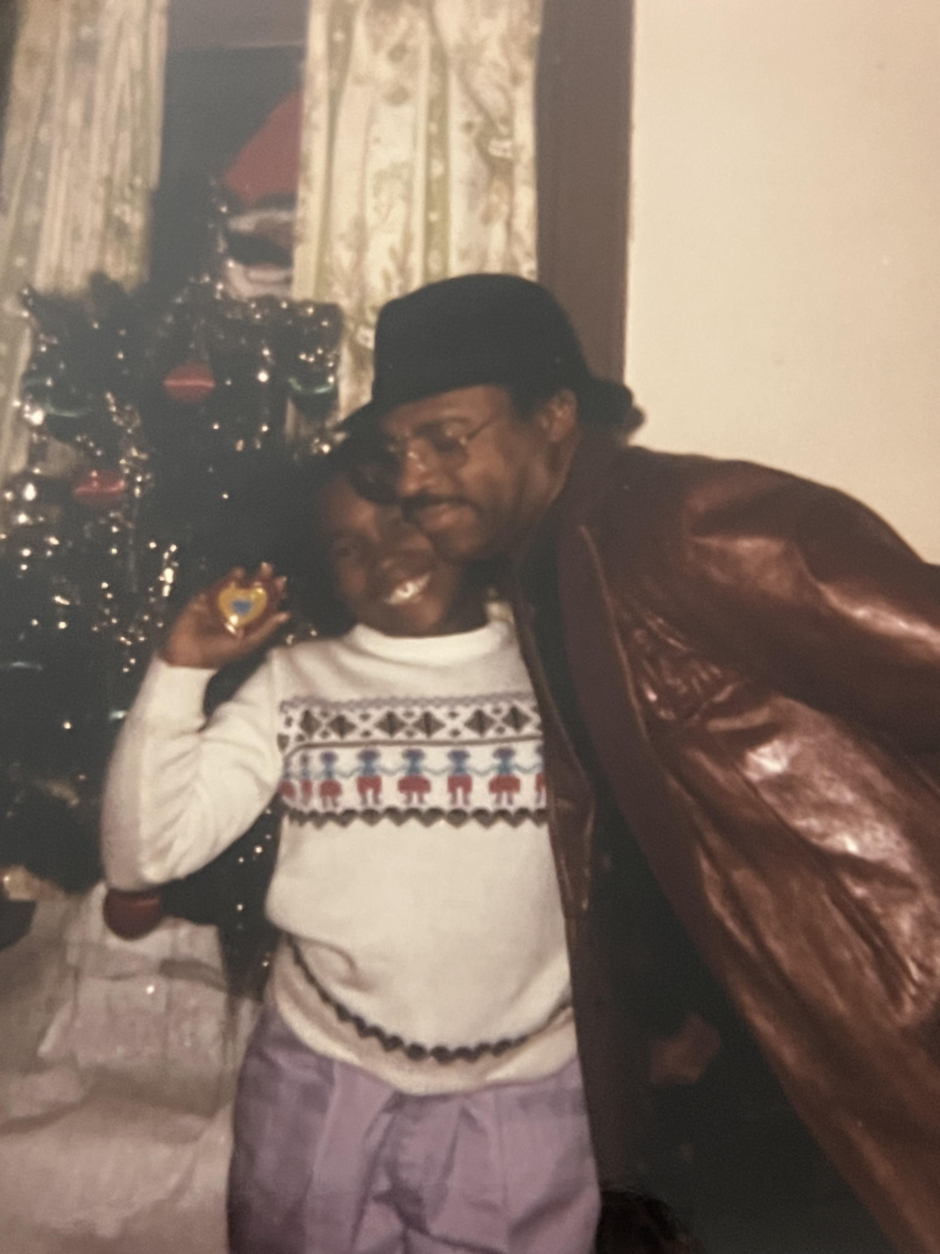 A man and child posing for a picture