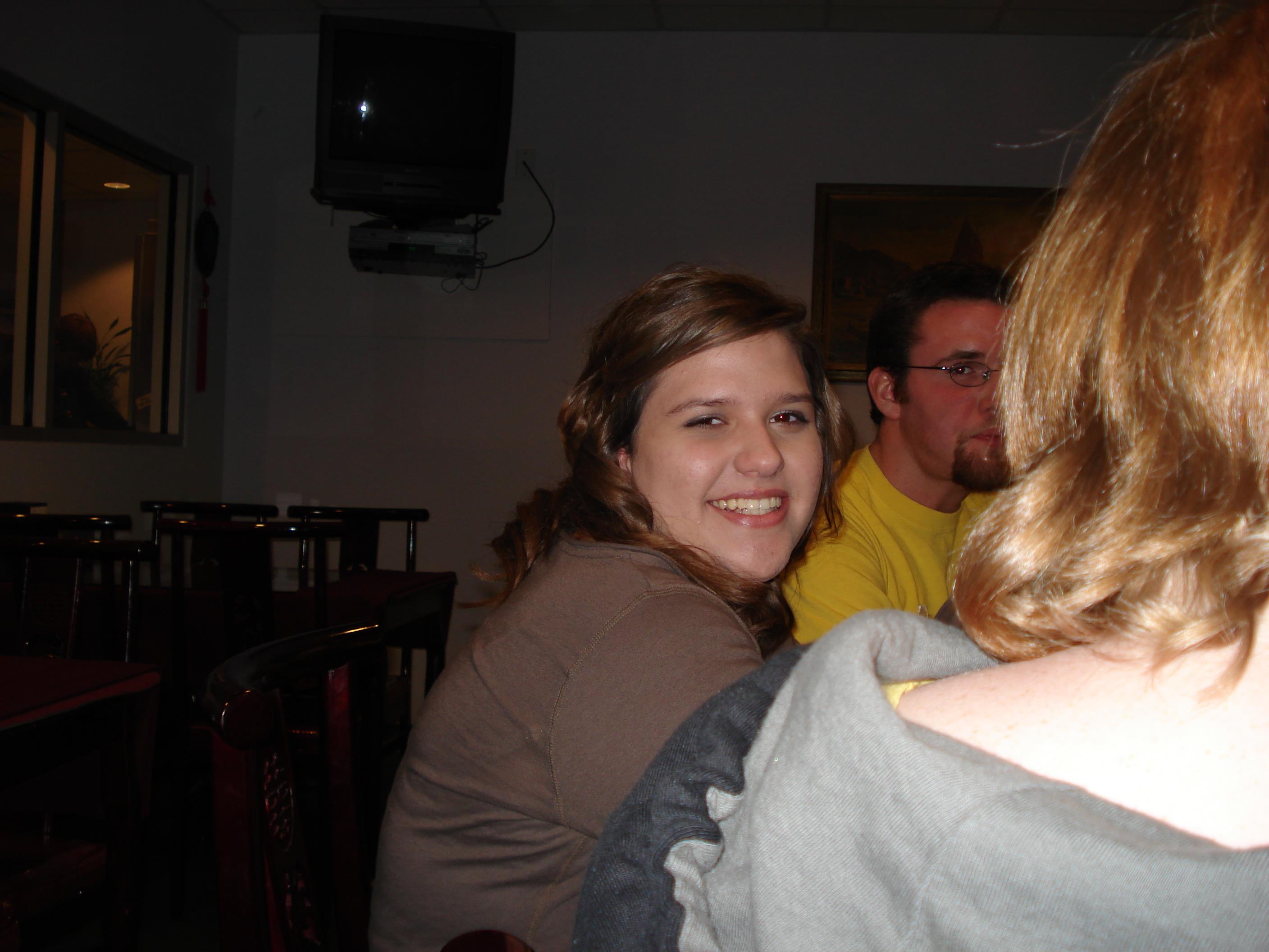 A woman smiling at the camera