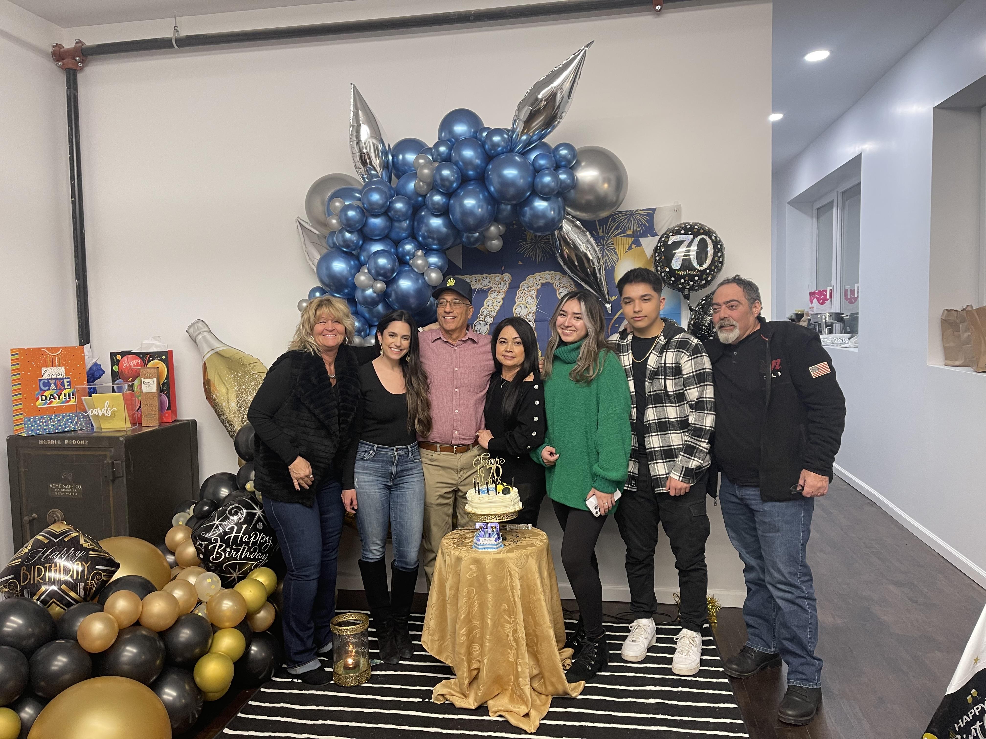 A group of people posing for a photo