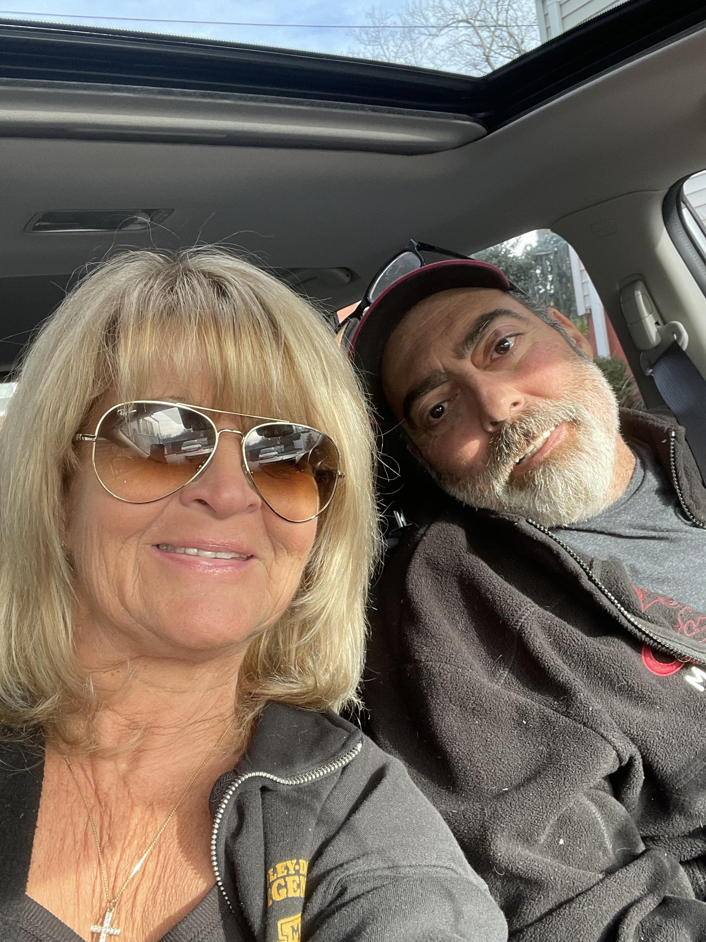 A man and woman taking a selfie