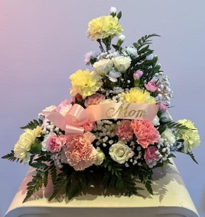 A bouquet of flowers on a box