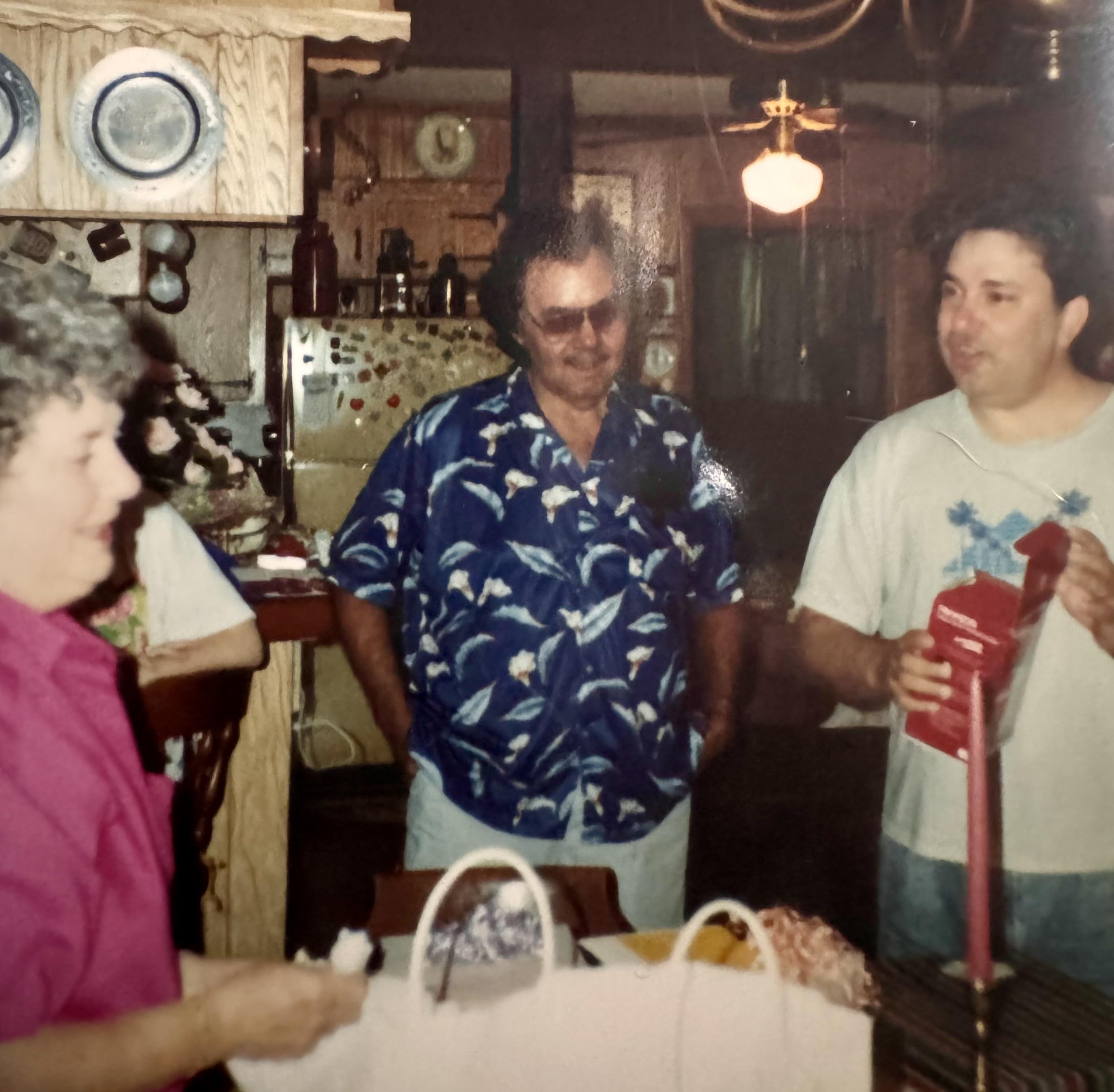 A group of people in a kitchen
