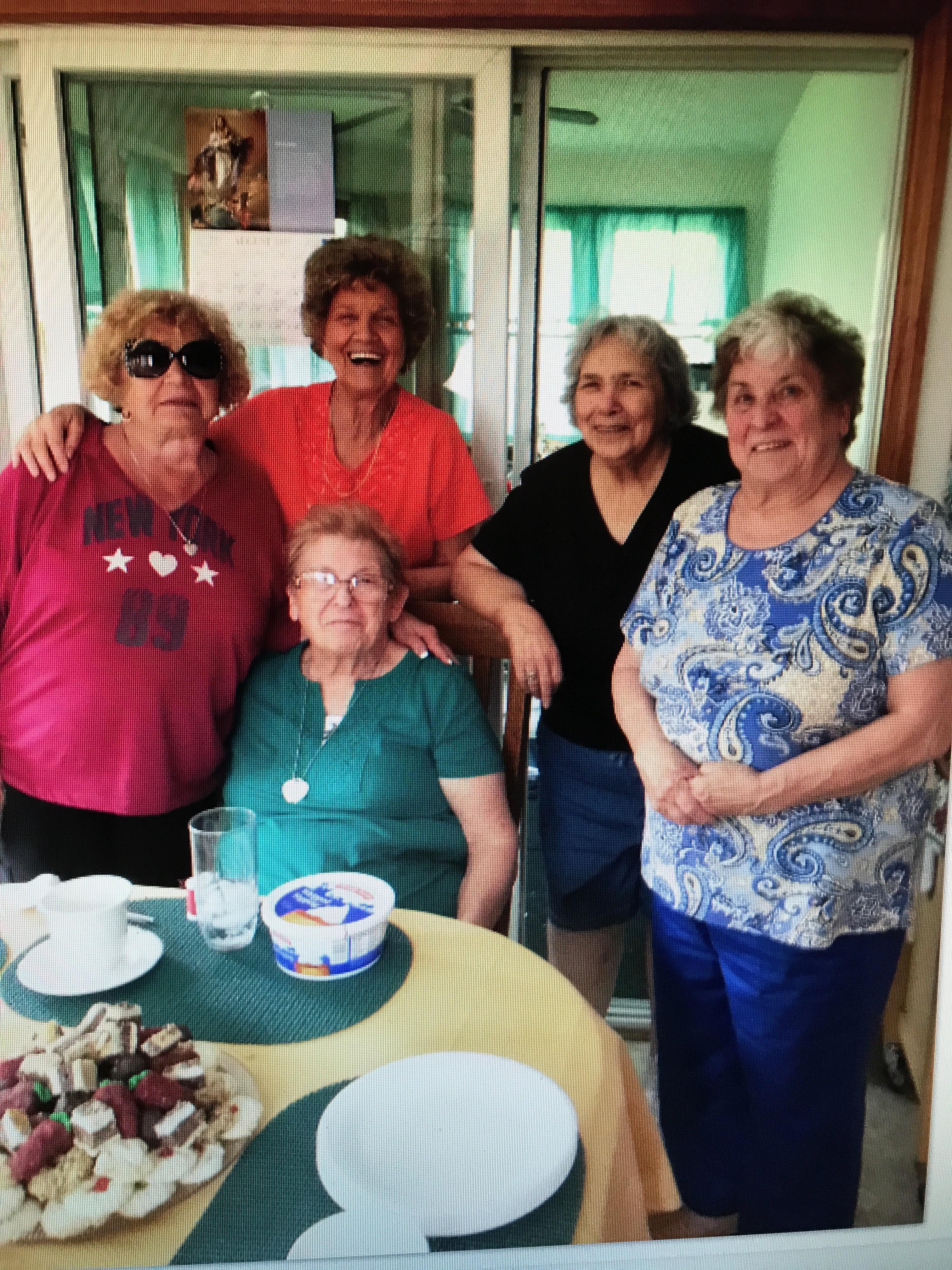 A group of women posing for a photo