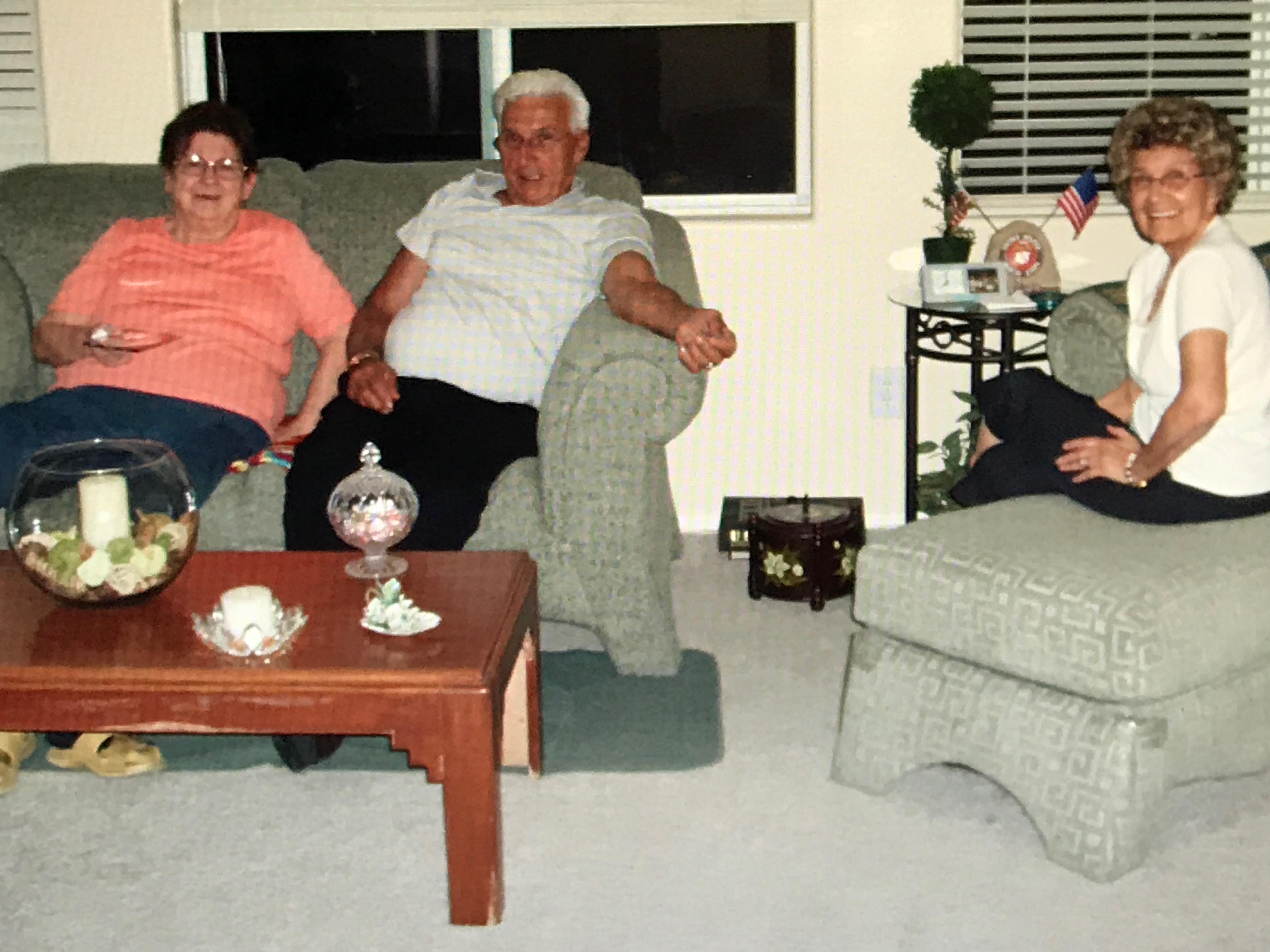 A group of people sitting in a living room
