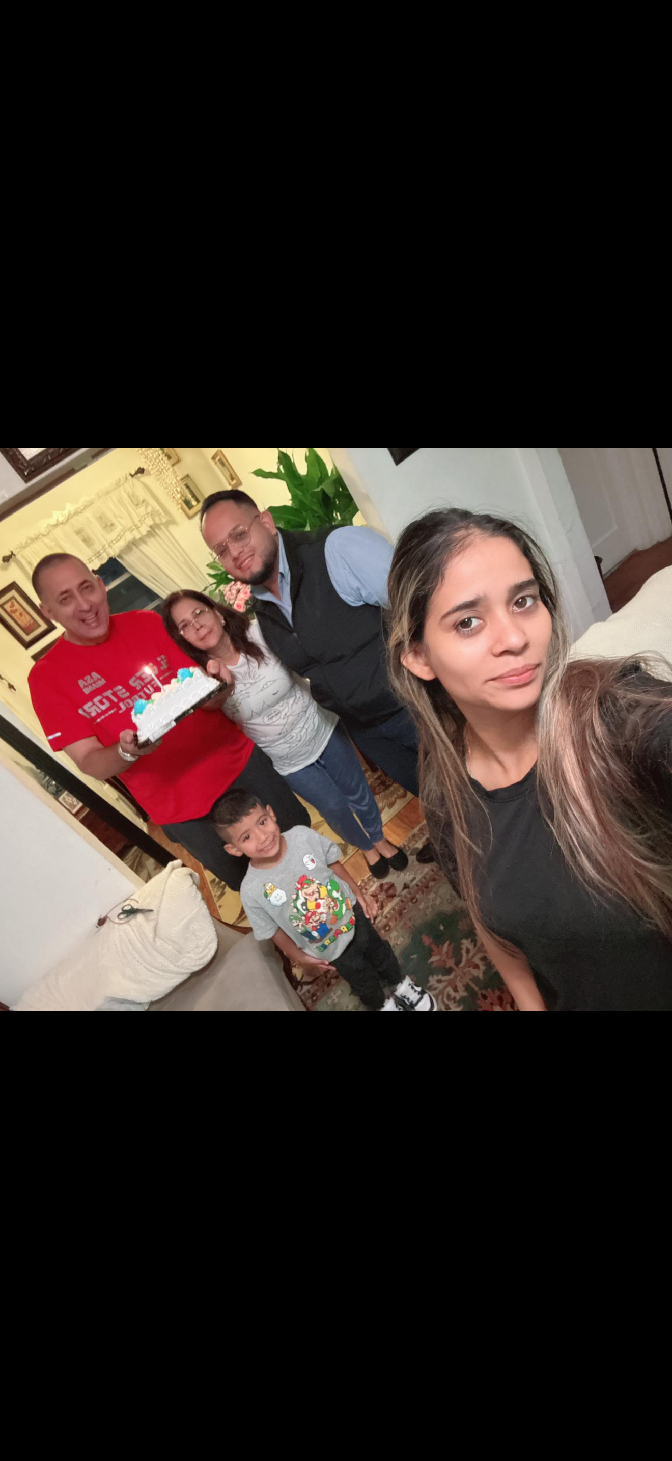 A group of people posing for a selfie