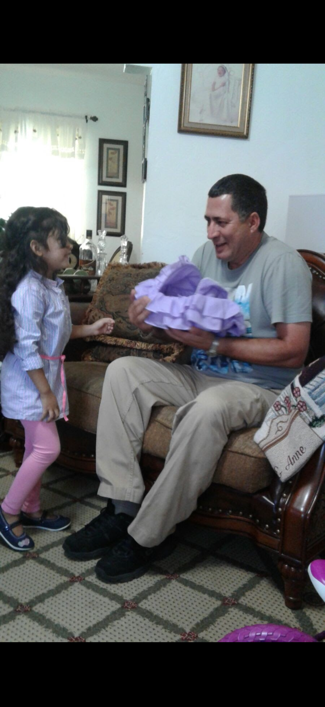 A man holding a doll